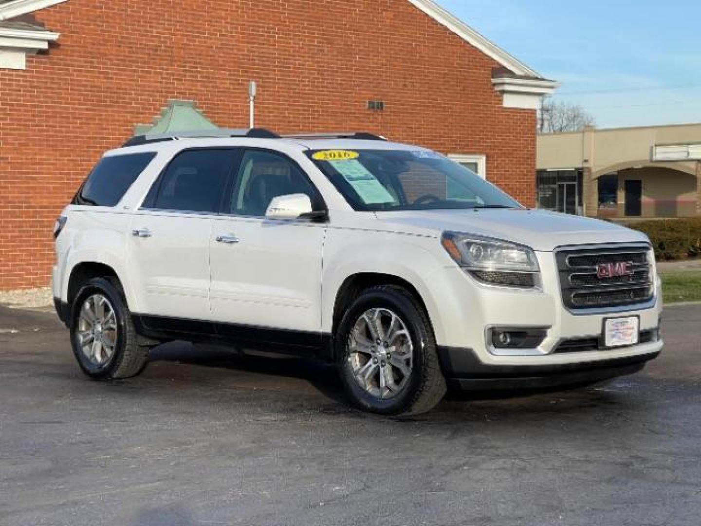 2016 Summit White GMC Acadia SLT-1 FWD (1GKKRRKD7GJ) with an 3.6L V6 DOHC 24V engine, 6-Speed Automatic transmission, located at 1230 East Main St, Xenia, OH, 45385, (937) 908-9800, 39.688026, -83.910172 - Photo#0