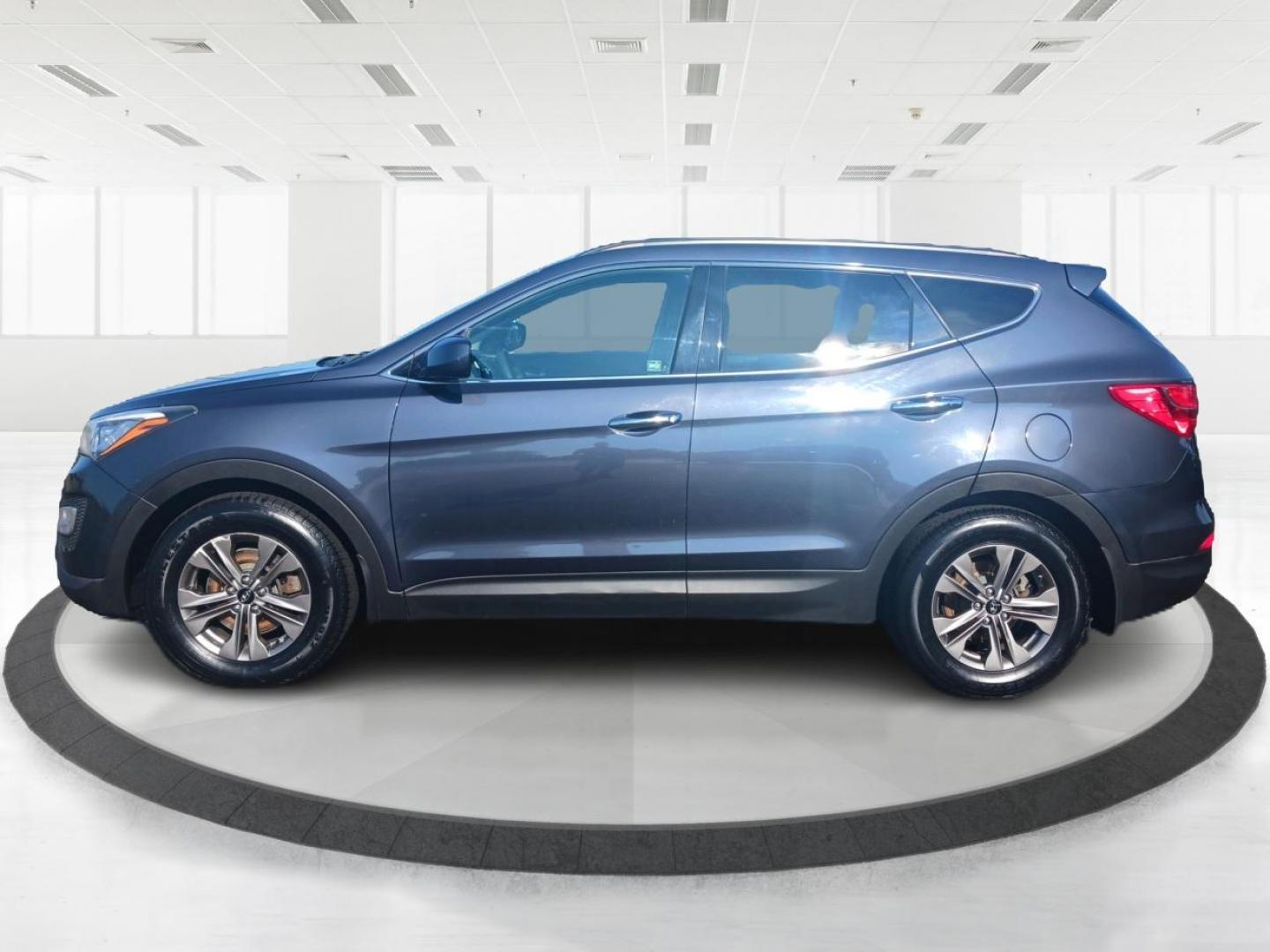 2016 Marlin Blue Hyundai Santa Fe Sport 2.4 AWD (5XYZUDLB5GG) with an 2.4L L4 DOHC 16V engine, 6-Speed Automatic transmission, located at 1184 Kauffman Ave, Fairborn, OH, 45324, (937) 908-9800, 39.807072, -84.030914 - Photo#5