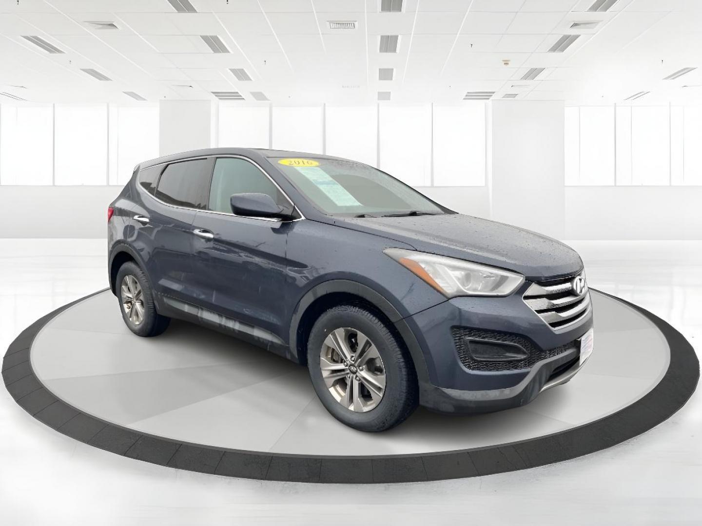 2016 Marlin Blue Hyundai Santa Fe (5XYZTDLB9GG) with an 2.4L L4 DOHC 16V engine, 6-Speed Automatic transmission, located at 401 Woodman Dr, Riverside, OH, 45431, (937) 908-9800, 39.760899, -84.123421 - Photo#0