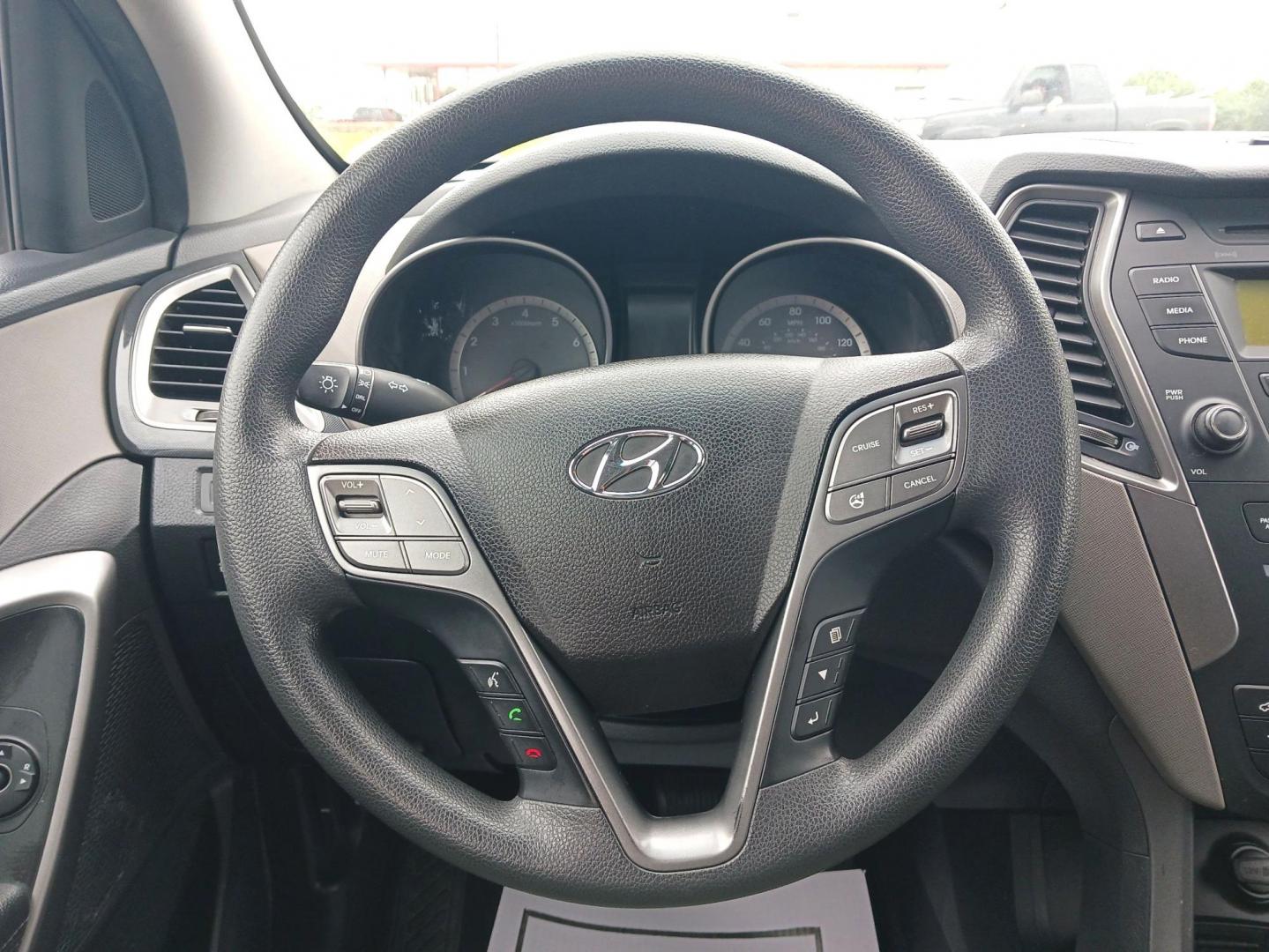 2016 Mineral Gray Hyundai Santa Fe (5XYZT3LB2GG) with an 2.4L L4 DOHC 16V engine, 6-Speed Automatic transmission, located at 401 Woodman Dr, Riverside, OH, 45431, (937) 908-9800, 39.760899, -84.123421 - Photo#15