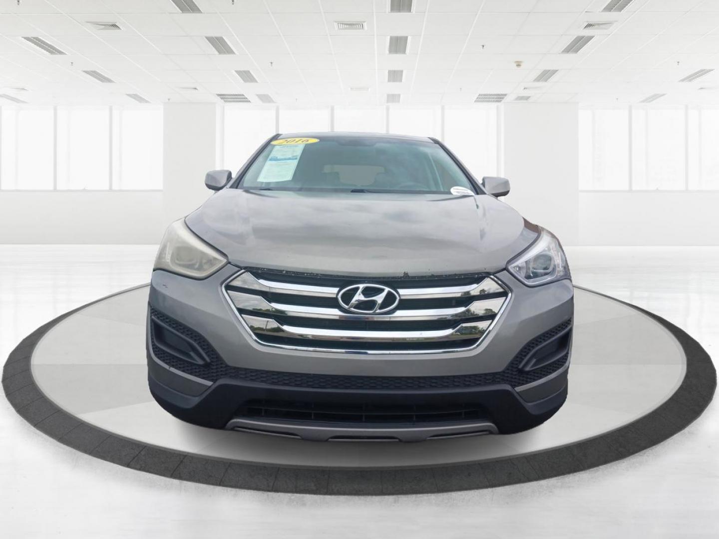 2016 Mineral Gray Hyundai Santa Fe (5XYZT3LB2GG) with an 2.4L L4 DOHC 16V engine, 6-Speed Automatic transmission, located at 401 Woodman Dr, Riverside, OH, 45431, (937) 908-9800, 39.760899, -84.123421 - Photo#6