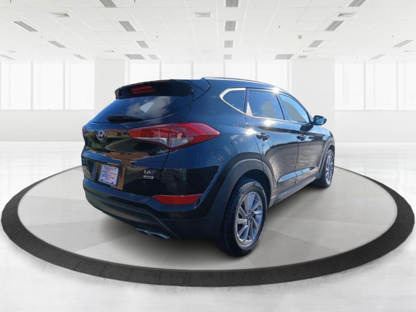 2016 Hyundai Tucson Eco AWD (KM8J3CA29GU) with an 1.6L L4 DOHC 16V engine, 7-Speed Automatic transmission, located at 880 E. National Road, Vandalia, OH, 45377, (937) 908-9800, 39.891918, -84.183594 - 2016 Hyundai Tucson Eco AWD - Photo#2