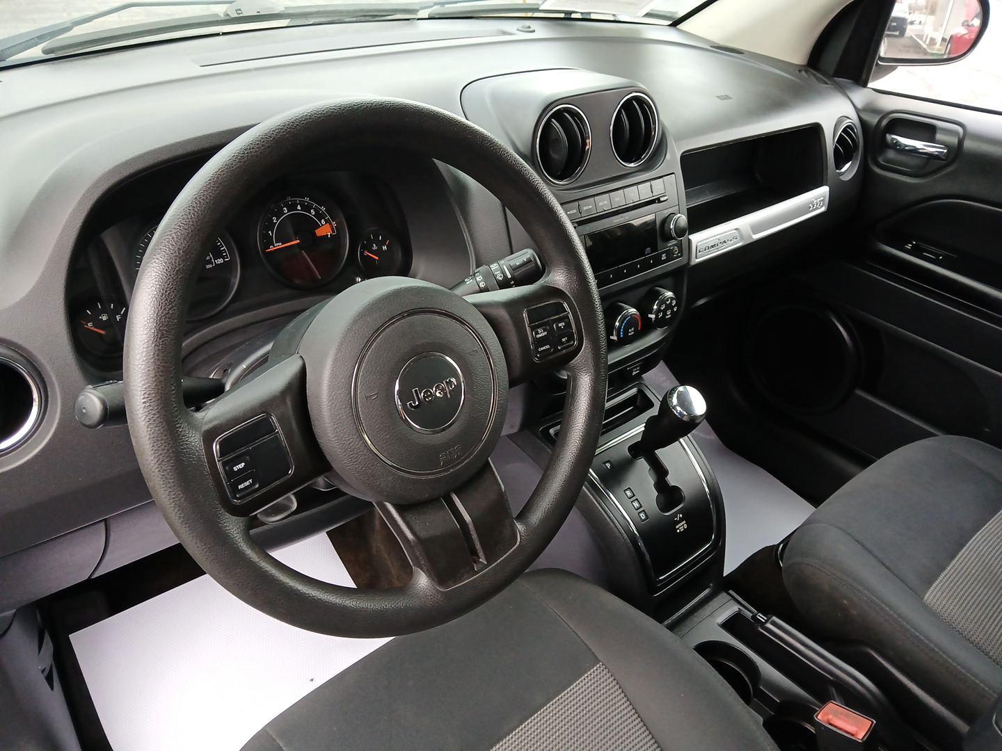 2016 Blue Jeep Compass Sport 4WD (1C4NJDBB9GD) with an 2.4L L4 DOHC 16V engine, located at 1184 Kauffman Ave, Fairborn, OH, 45324, (937) 908-9800, 39.807072, -84.030914 - Photo#8