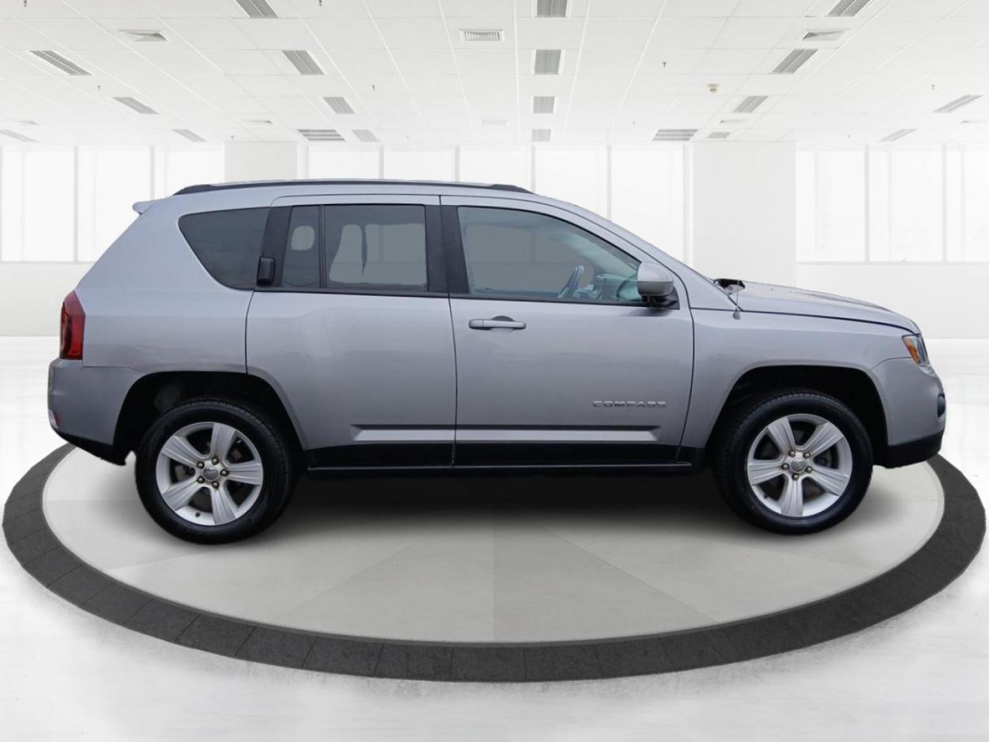 2016 Silver Jeep Compass Latitude 4WD (1C4NJDEB5GD) with an 2.4L L4 DOHC 16V engine, 6A transmission, located at 401 Woodman Dr, Riverside, OH, 45431, (937) 908-9800, 39.760899, -84.123421 - Photo#1