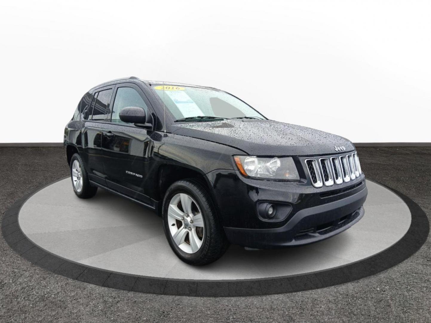 2016 Black Jeep Compass (1C4NJCBA6GD) with an 2.0L L4 DOHC 16V engine, located at 1184 Kauffman Ave, Fairborn, OH, 45324, (937) 908-9800, 39.807072, -84.030914 - Photo#0