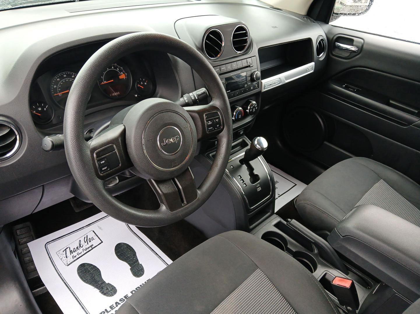 2016 Black Jeep Compass (1C4NJCBA6GD) with an 2.0L L4 DOHC 16V engine, located at 1184 Kauffman Ave, Fairborn, OH, 45324, (937) 908-9800, 39.807072, -84.030914 - Photo#8