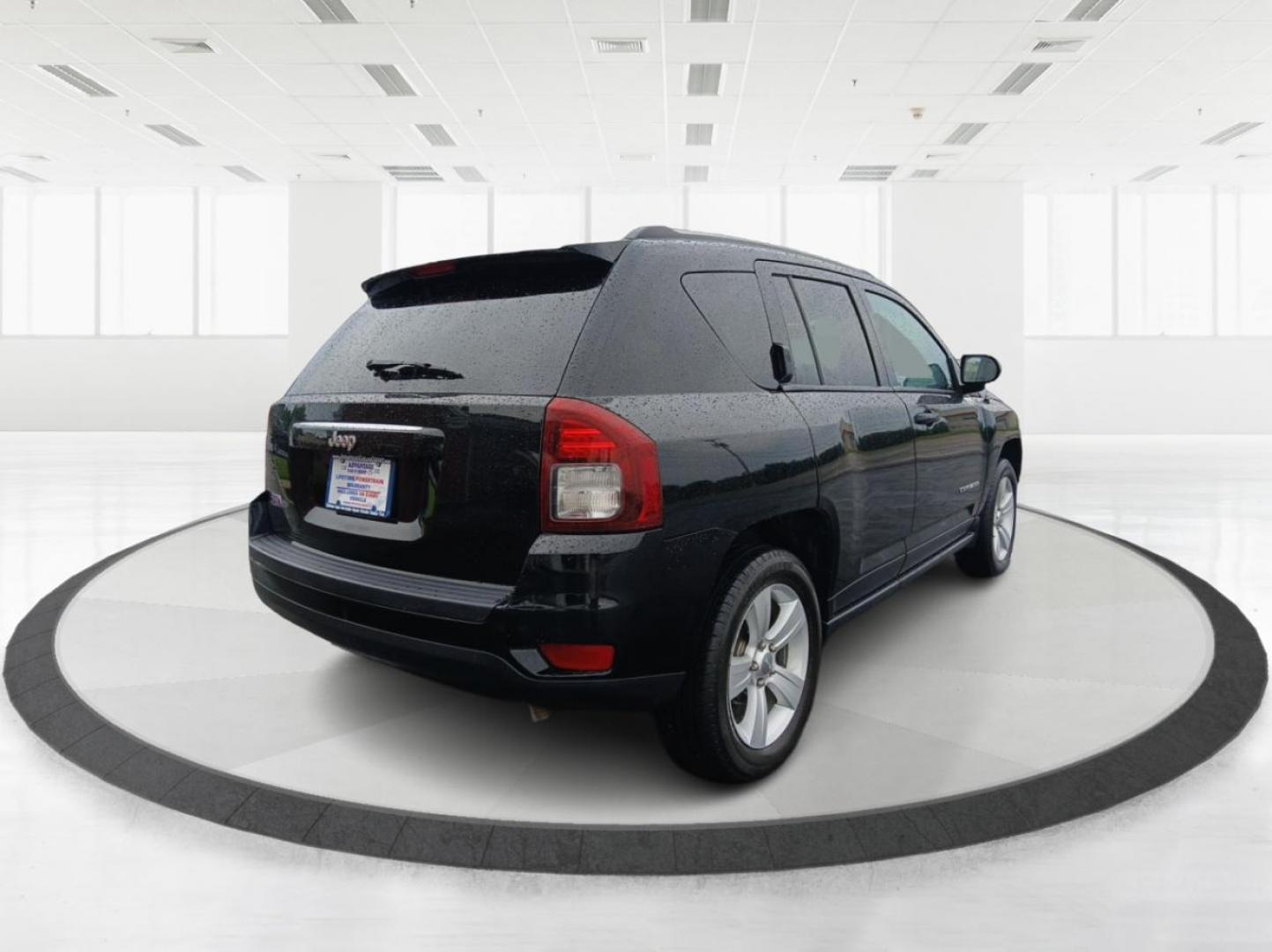 2016 Black Jeep Compass (1C4NJCBA6GD) with an 2.0L L4 DOHC 16V engine, located at 1184 Kauffman Ave, Fairborn, OH, 45324, (937) 908-9800, 39.807072, -84.030914 - Photo#2