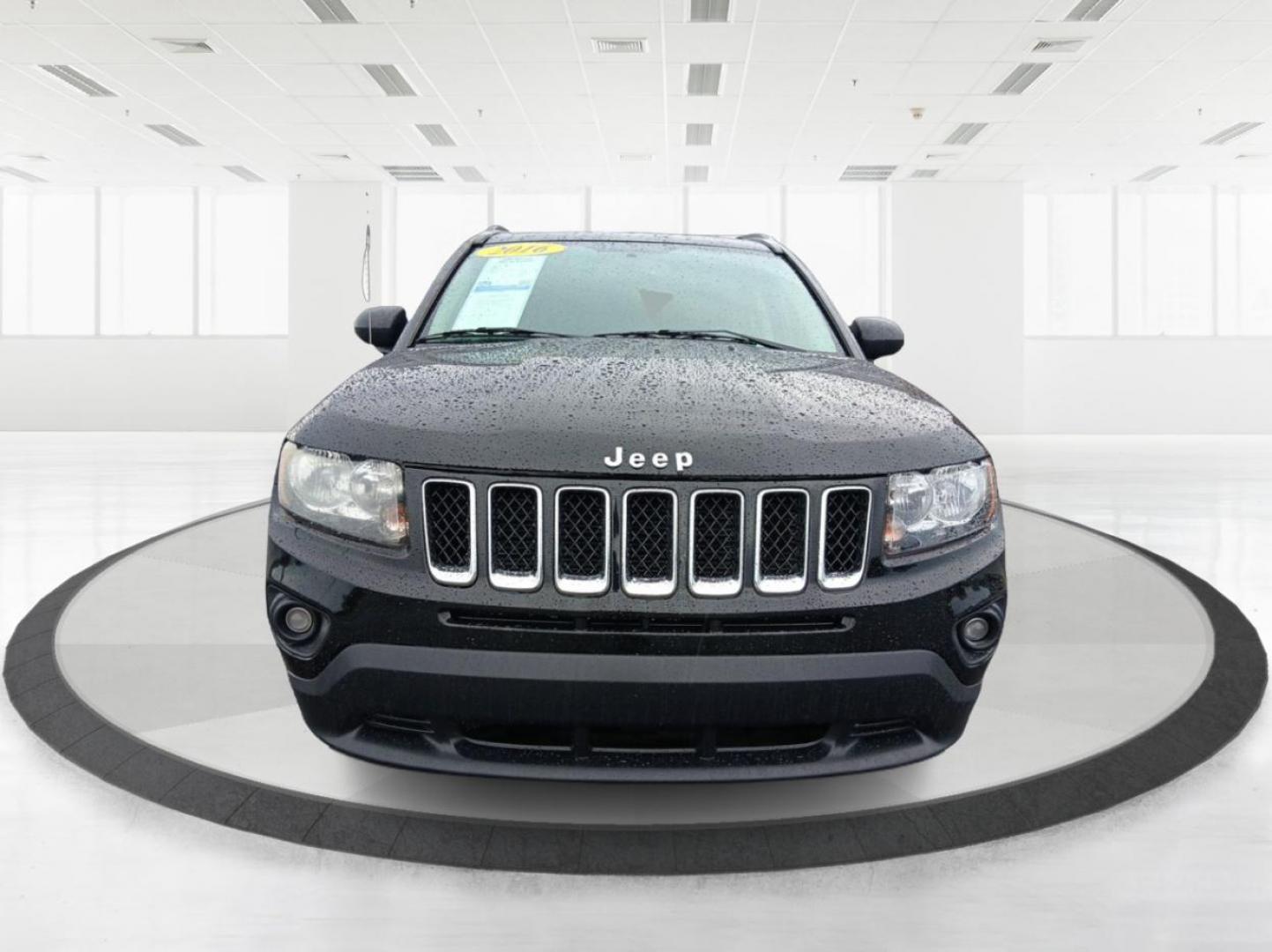 2016 Black Jeep Compass (1C4NJCBA6GD) with an 2.0L L4 DOHC 16V engine, located at 1184 Kauffman Ave, Fairborn, OH, 45324, (937) 908-9800, 39.807072, -84.030914 - Photo#6