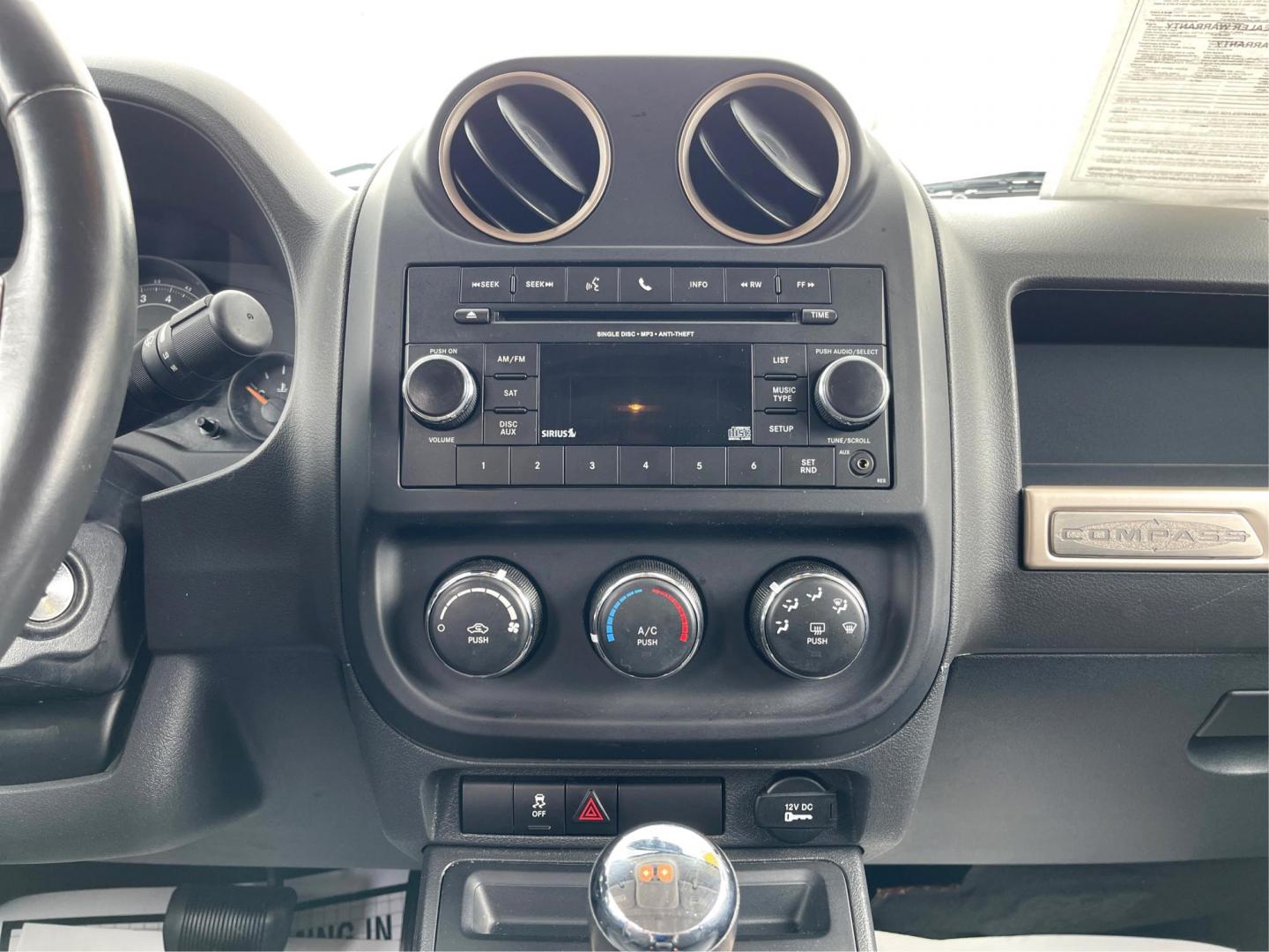 2016 White Jeep Compass Sport FWD (1C4NJCBBXGD) with an 2.4L L4 DOHC 16V engine, located at 4508 South Dixie Dr, Moraine, OH, 45439, (937) 908-9800, 39.689976, -84.218452 - Photo#11