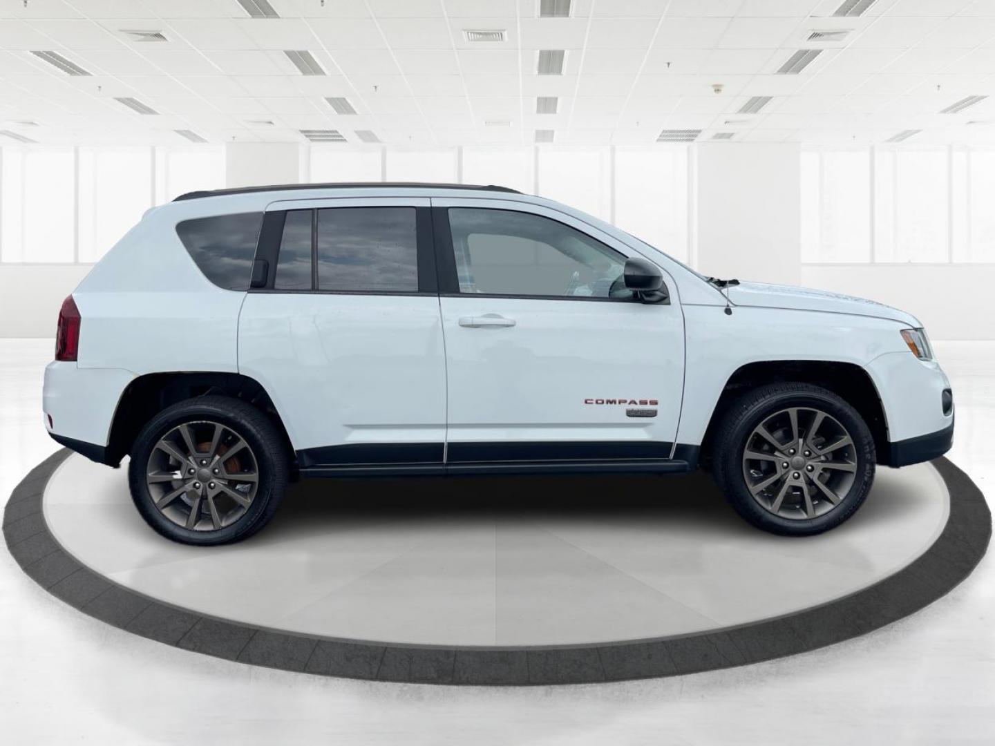 2016 White Jeep Compass (1C4NJCBBXGD) with an 2.4L L4 DOHC 16V engine, located at 4508 South Dixie Dr, Moraine, OH, 45439, (937) 908-9800, 39.689976, -84.218452 - Photo#1