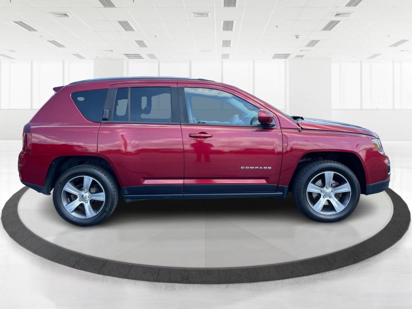 2016 Red Jeep Compass Latitude 4WD (1C4NJDEB3GD) with an 2.4L L4 DOHC 16V engine, 6A transmission, located at 1230 East Main St, Xenia, OH, 45385, (937) 908-9800, 39.688026, -83.910172 - Photo#1