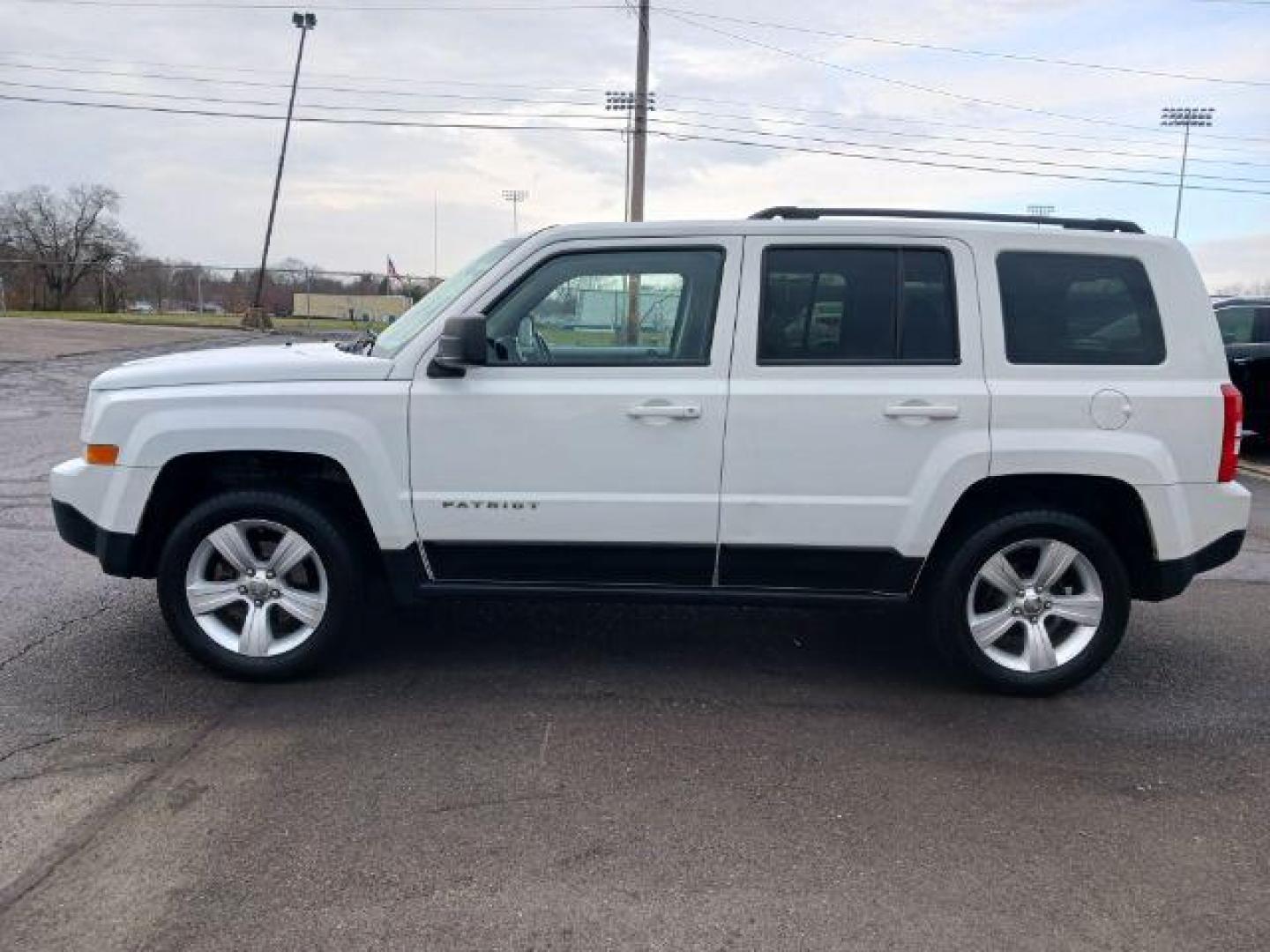 2016 White Jeep Patriot Latitude 4WD (1C4NJRFB7GD) with an 2.4L L4 DOHC 16V engine, located at 1951 S Dayton Lakeview Rd., New Carlisle, OH, 45344, (937) 908-9800, 39.890999, -84.050255 - Photo#3