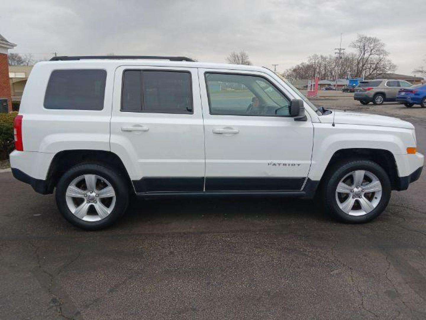 2016 White Jeep Patriot Latitude 4WD (1C4NJRFB7GD) with an 2.4L L4 DOHC 16V engine, located at 1951 S Dayton Lakeview Rd., New Carlisle, OH, 45344, (937) 908-9800, 39.890999, -84.050255 - Photo#5