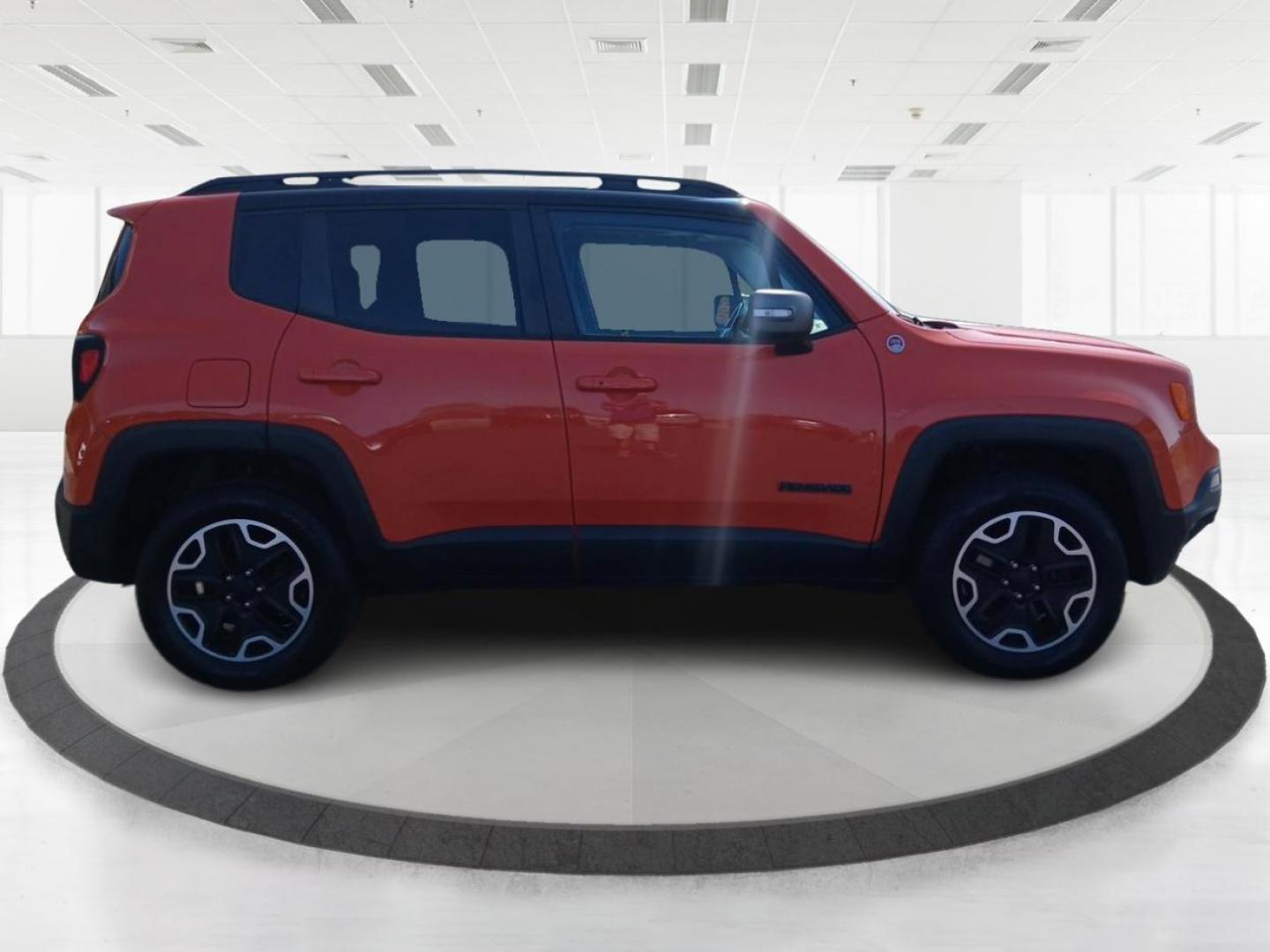 2016 Omaha Orange Jeep Renegade Trailhawk (ZACCJBCTXGP) with an 2.4L L4 DOHC 16V engine, 9A transmission, located at 1230 East Main St, Xenia, OH, 45385, (937) 908-9800, 39.688026, -83.910172 - Photo#0