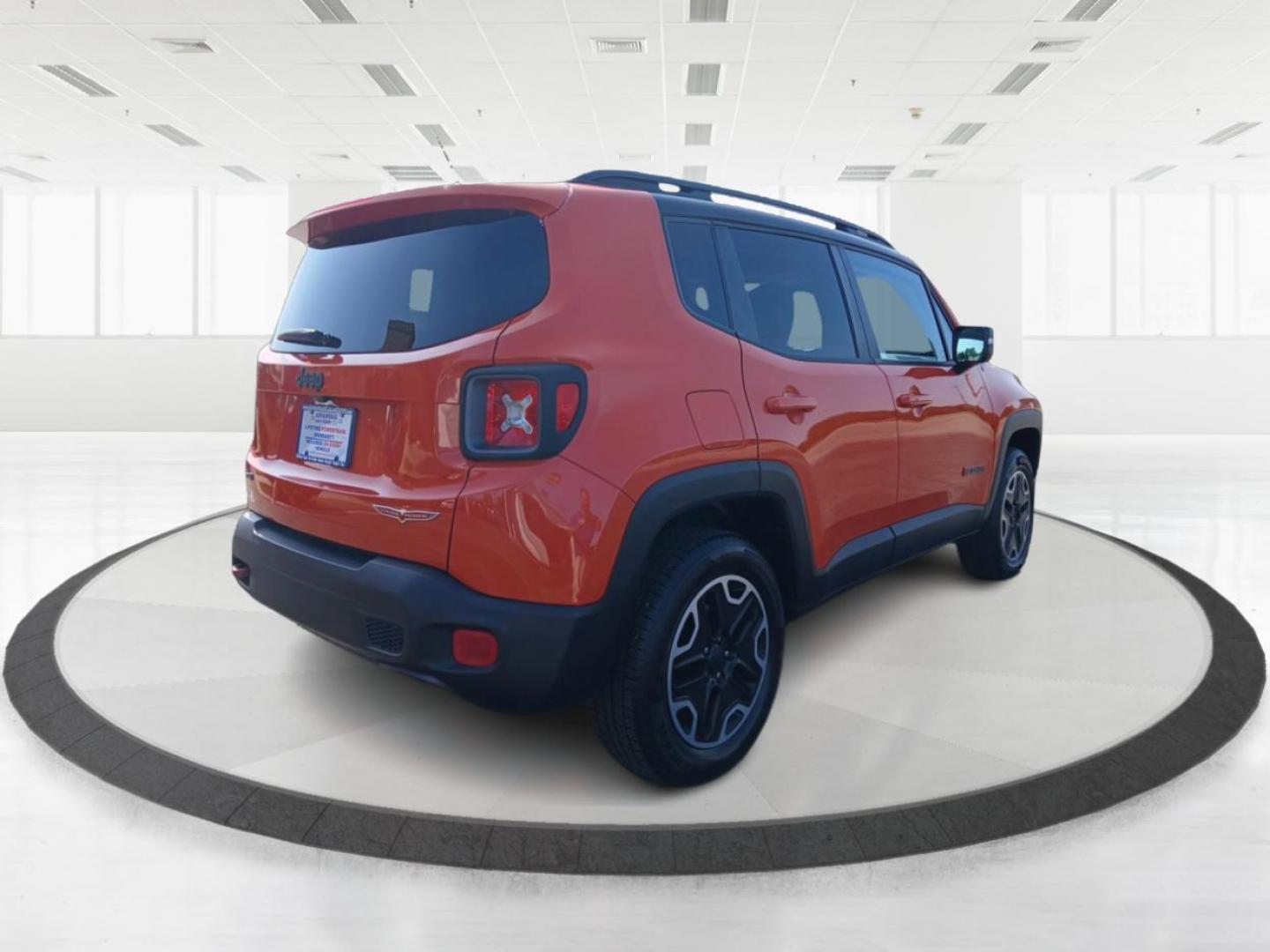 2016 Omaha Orange Jeep Renegade Trailhawk (ZACCJBCTXGP) with an 2.4L L4 DOHC 16V engine, 9A transmission, located at 1230 East Main St, Xenia, OH, 45385, (937) 908-9800, 39.688026, -83.910172 - Photo#1