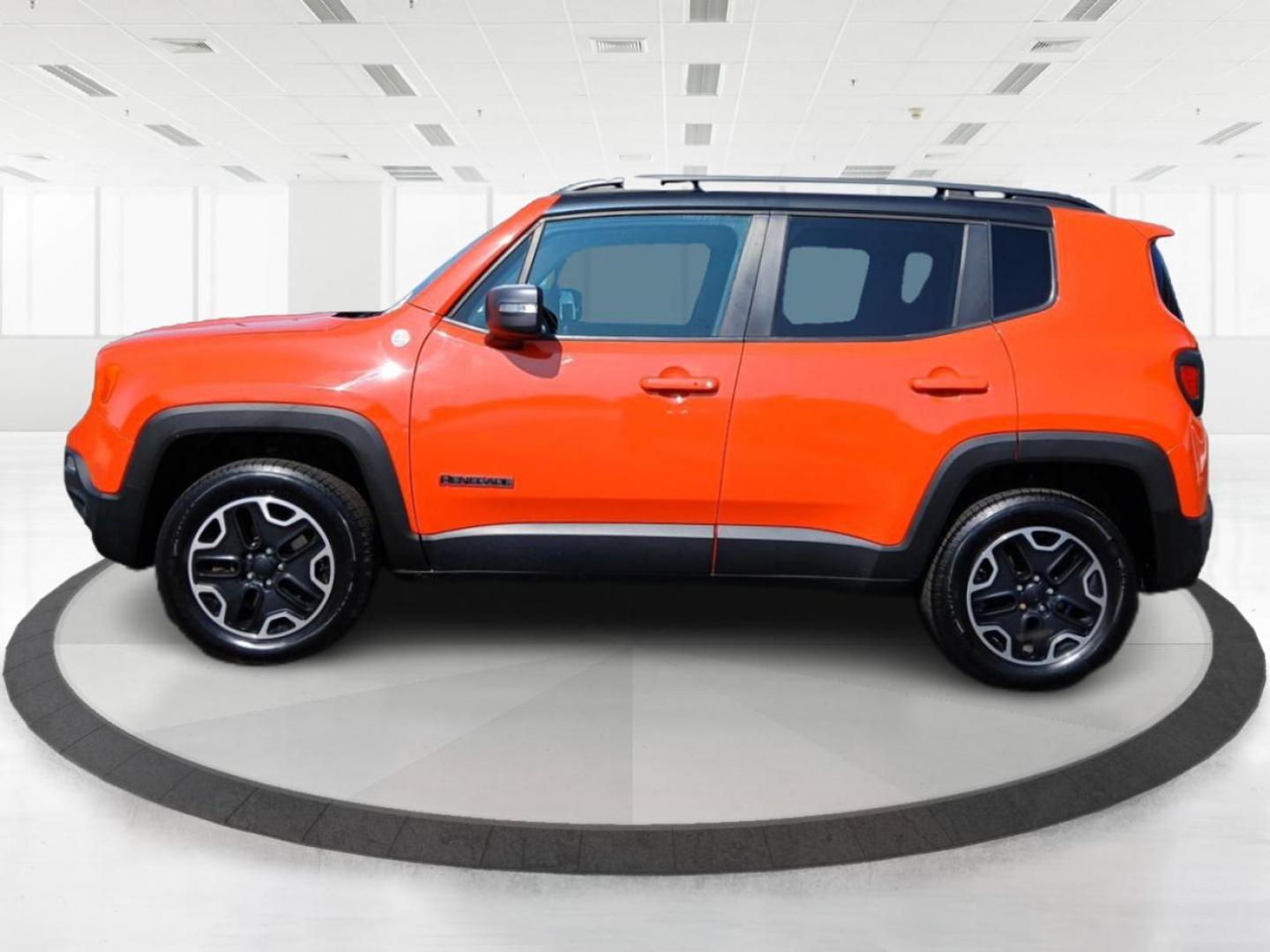 2016 Omaha Orange Jeep Renegade Trailhawk (ZACCJBCTXGP) with an 2.4L L4 DOHC 16V engine, 9A transmission, located at 1230 East Main St, Xenia, OH, 45385, (937) 908-9800, 39.688026, -83.910172 - Photo#3