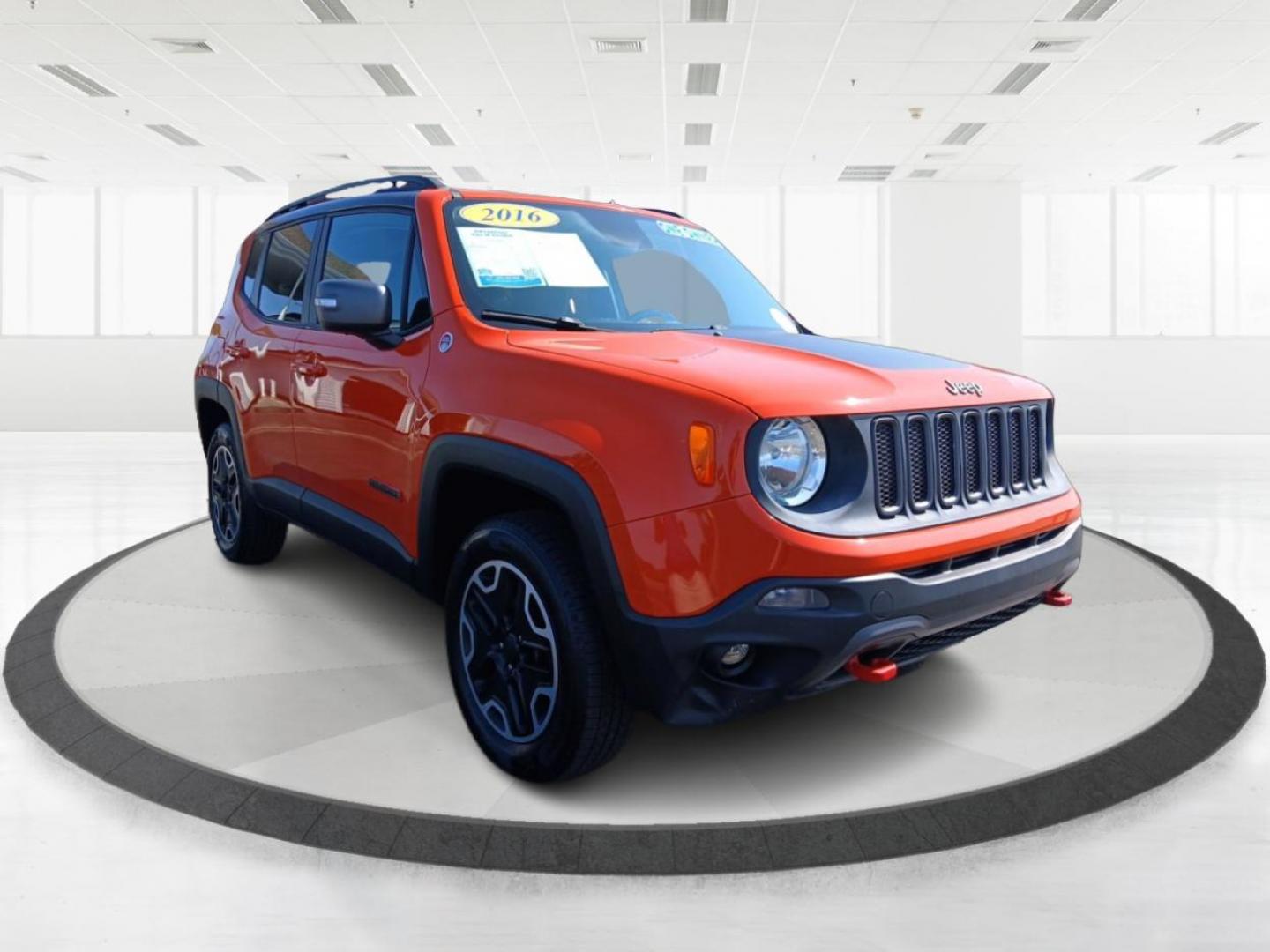 2016 Omaha Orange Jeep Renegade Trailhawk (ZACCJBCTXGP) with an 2.4L L4 DOHC 16V engine, 9A transmission, located at 1230 East Main St, Xenia, OH, 45385, (937) 908-9800, 39.688026, -83.910172 - Photo#5