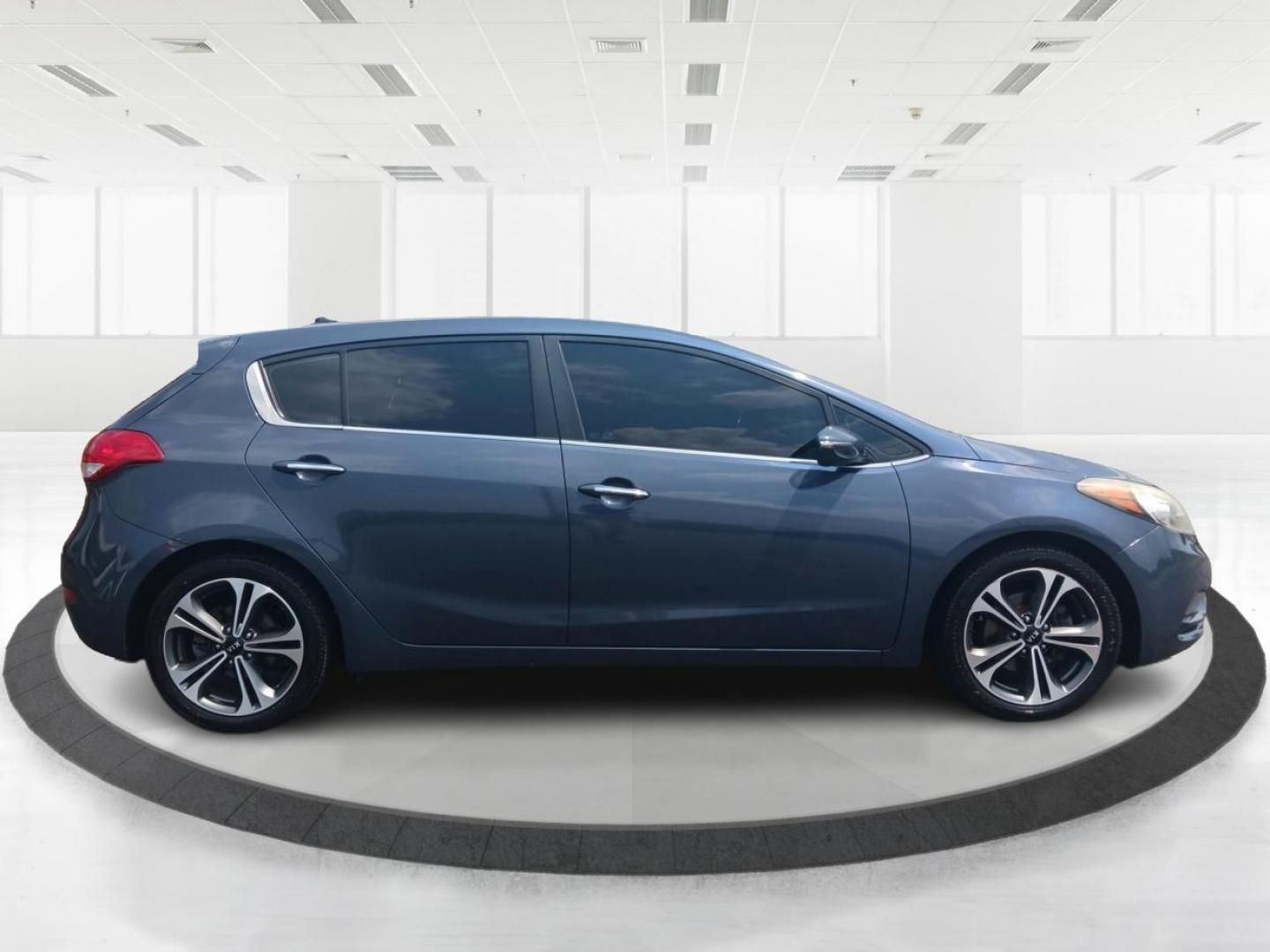 2016 Steel Blue Kia Forte 5-Door (KNAFX5A89G5) with an 2.0L L4 DOHC 16V engine, 6-Speed Automatic transmission, located at 1230 East Main St, Xenia, OH, 45385, (937) 908-9800, 39.688026, -83.910172 - Photo#1