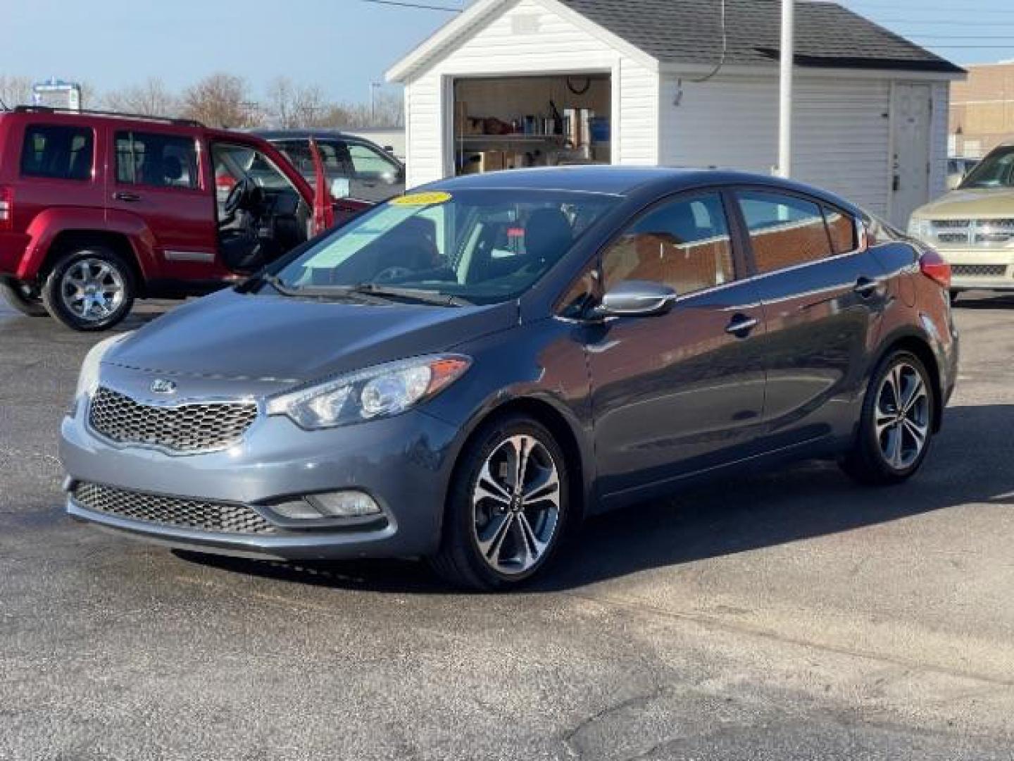 2016 Graphite Steel Kia Forte EX (KNAFX4A85G5) with an 2.0L L4 DOHC 16V engine, 6-Speed Automatic transmission, located at 1230 East Main St, Xenia, OH, 45385, (937) 908-9800, 39.688026, -83.910172 - Photo#1