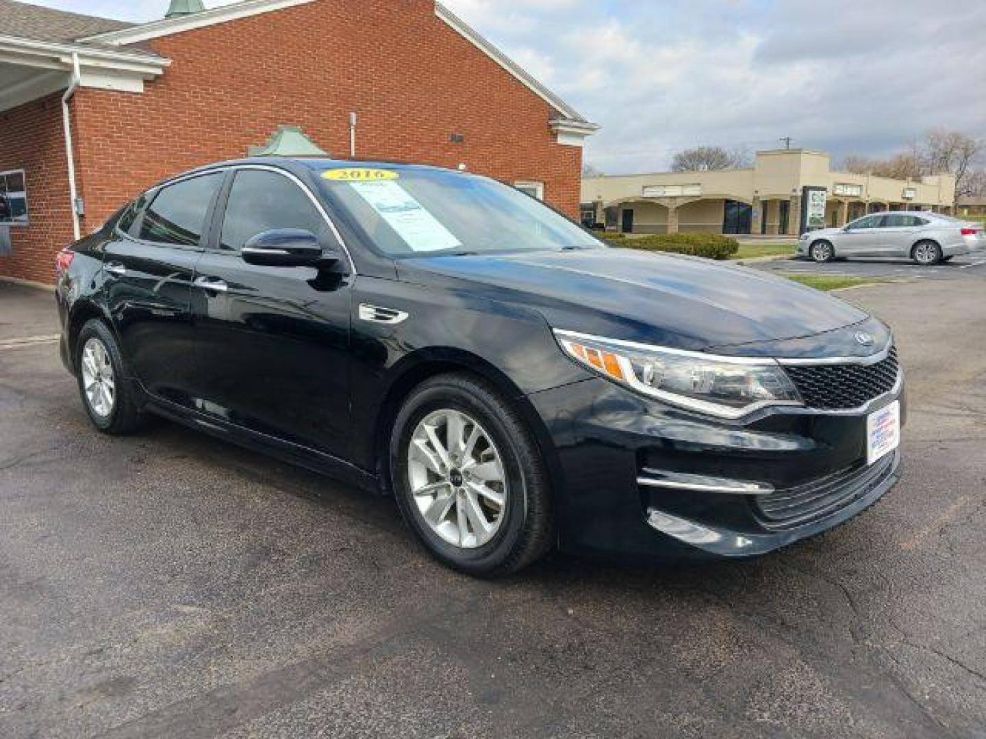 2016 Ebony Black Kia Optima LX (5XXGT4L39GG) with an 2.4L L4 DOHC 16V engine, 6-Speed Automatic transmission, located at 1230 East Main St, Xenia, OH, 45385, (937) 908-9800, 39.688026, -83.910172 - Photo#0