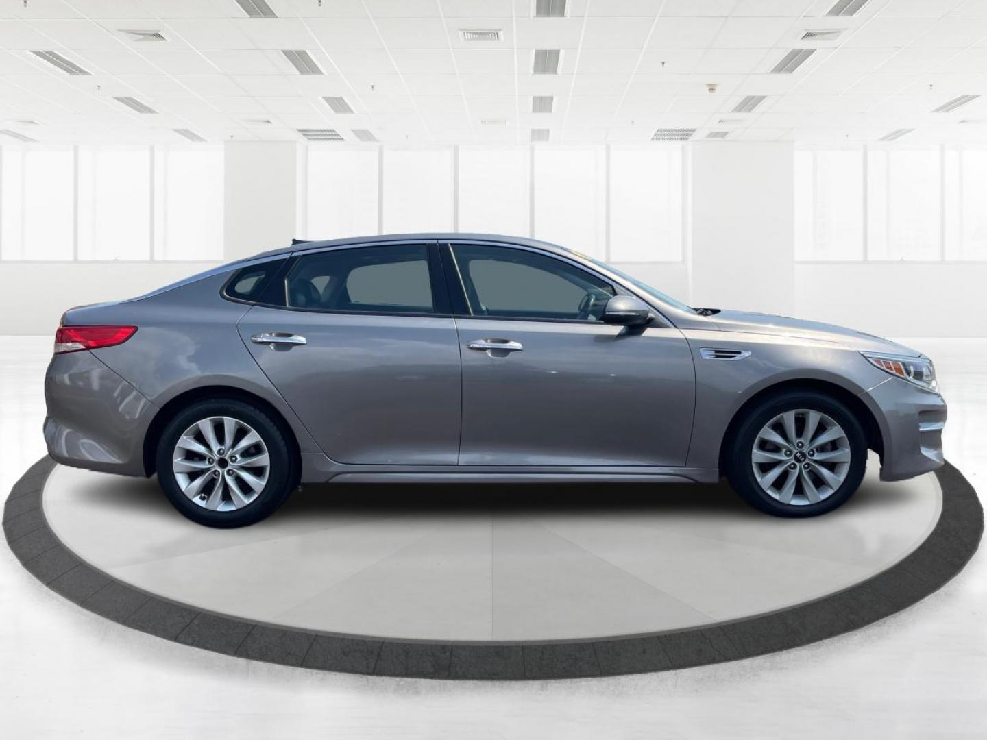 2016 Kia Optima EX (5XXGU4L38GG) with an 2.4L L4 DOHC 16V engine, 6-Speed Automatic transmission, located at 1951 S Dayton Lakeview Rd., New Carlisle, OH, 45344, (937) 908-9800, 39.890999, -84.050255 - 2016 Kia Optima EX - Photo#1