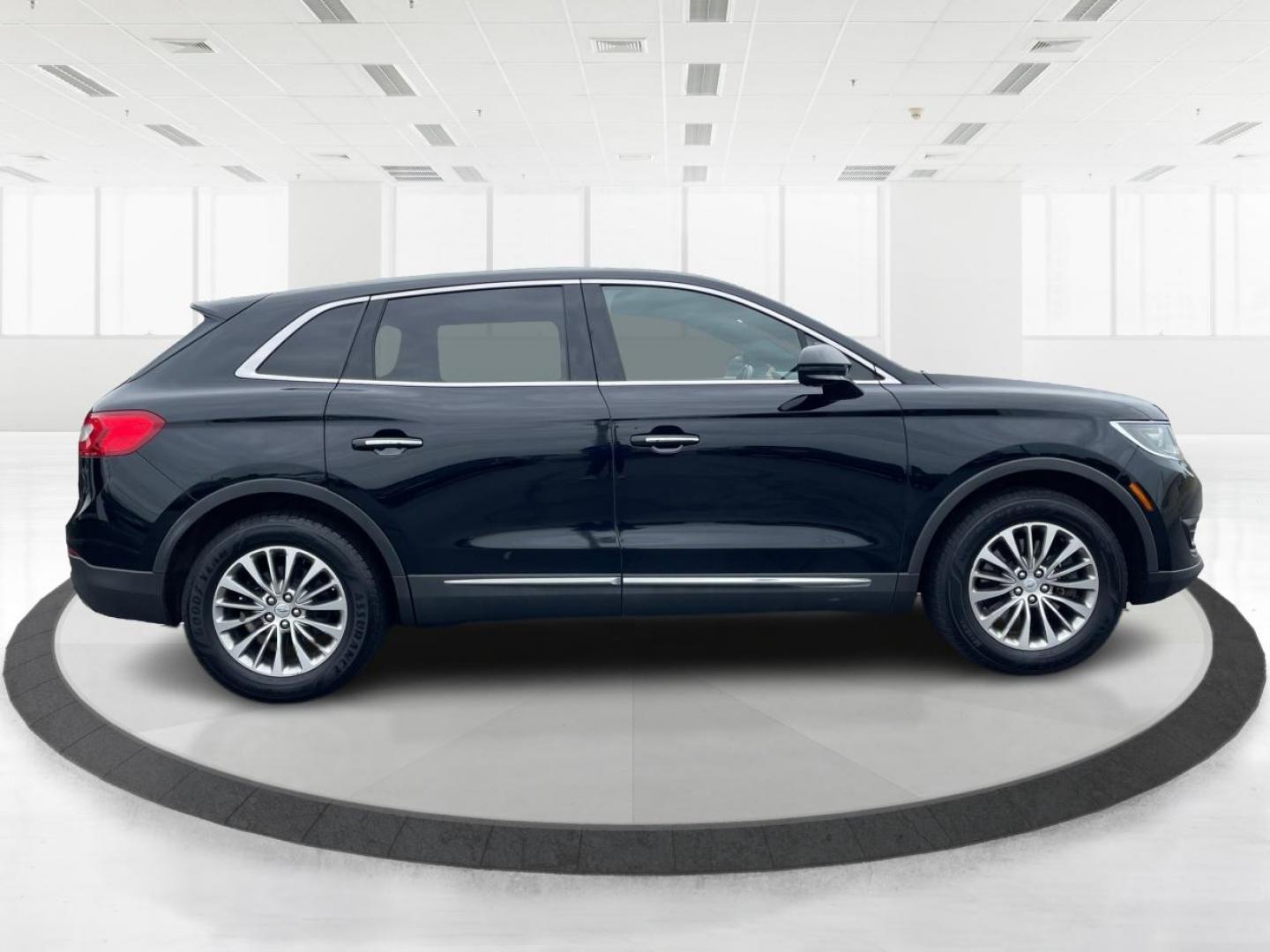 2016 Black Velvet Metallic Lincoln MKX Select AWD (2LMTJ8KR7GB) with an 3.7L V6 DOHC 24V engine, 6A transmission, located at 1099 N County Rd 25A , Troy, OH, 45373, (937) 908-9800, 40.057079, -84.212883 - Photo#1