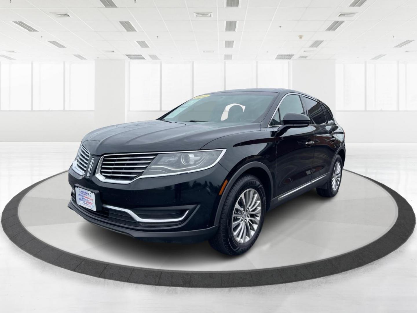 2016 Black Velvet Metallic Lincoln MKX Select AWD (2LMTJ8KR7GB) with an 3.7L V6 DOHC 24V engine, 6A transmission, located at 1099 N County Rd 25A , Troy, OH, 45373, (937) 908-9800, 40.057079, -84.212883 - Photo#7