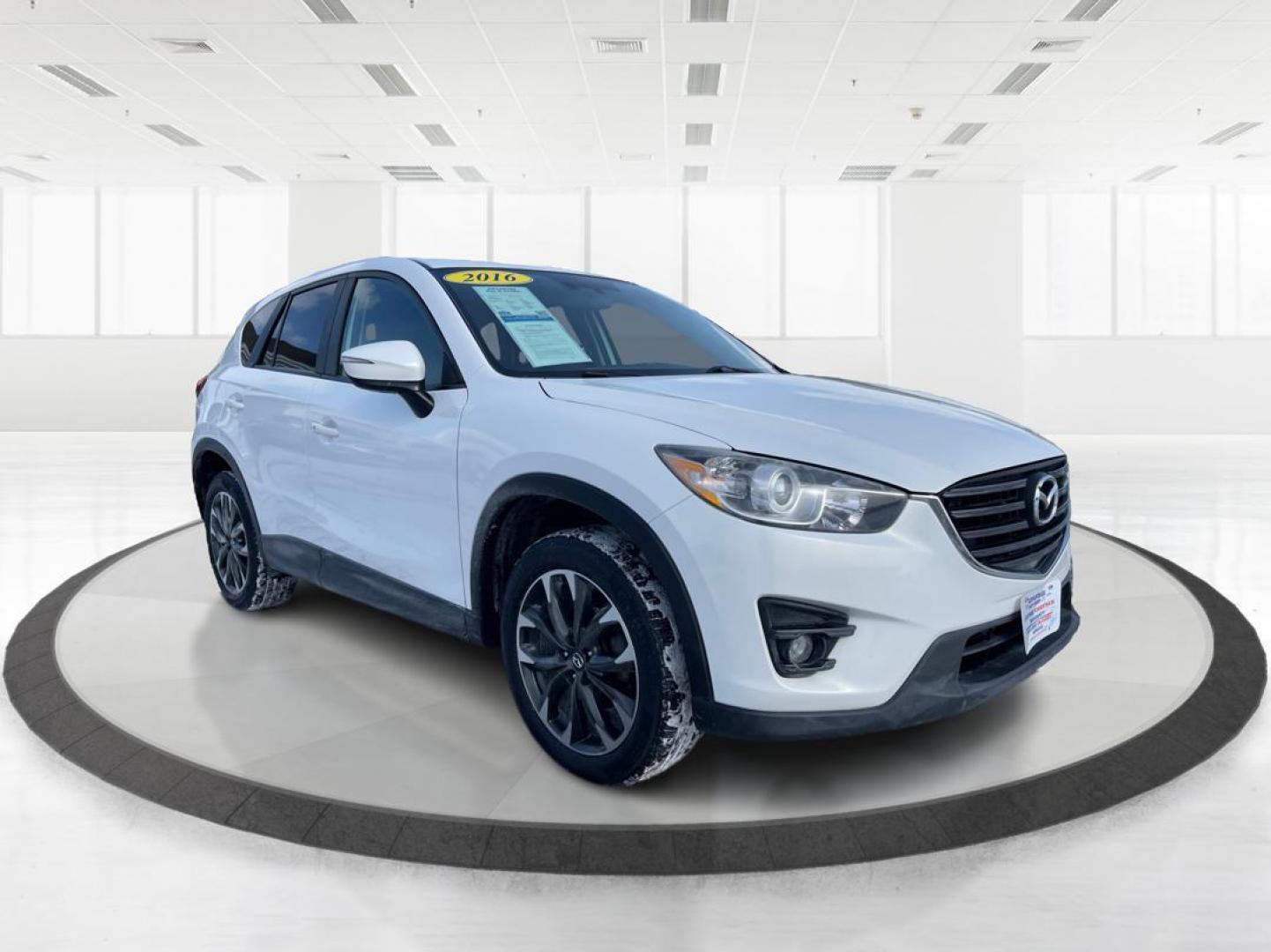 2016 Mazda CX-5 Grand Touring AWD (JM3KE4DY8G0) with an 2.5L L4 DOHC 16V engine, 6-Speed Automatic transmission, located at 1951 S Dayton Lakeview Rd., New Carlisle, OH, 45344, (937) 908-9800, 39.890999, -84.050255 - 2016 Mazda CX-5 Grand Touring AWD - Photo#0