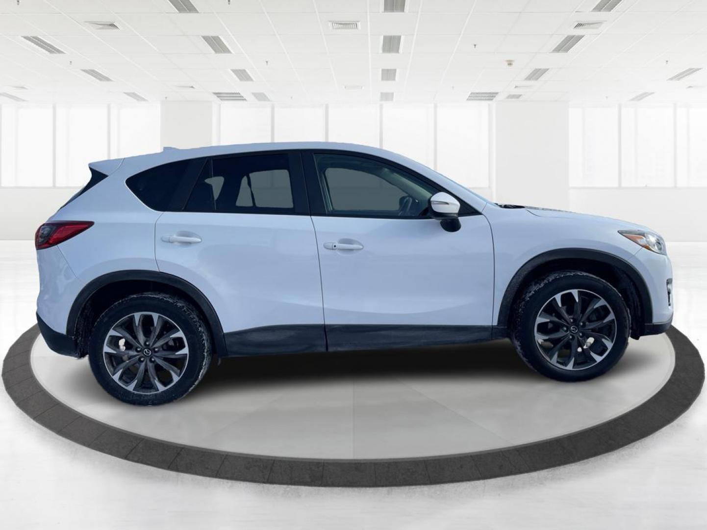 2016 Mazda CX-5 Grand Touring AWD (JM3KE4DY8G0) with an 2.5L L4 DOHC 16V engine, 6-Speed Automatic transmission, located at 1951 S Dayton Lakeview Rd., New Carlisle, OH, 45344, (937) 908-9800, 39.890999, -84.050255 - 2016 Mazda CX-5 Grand Touring AWD - Photo#1