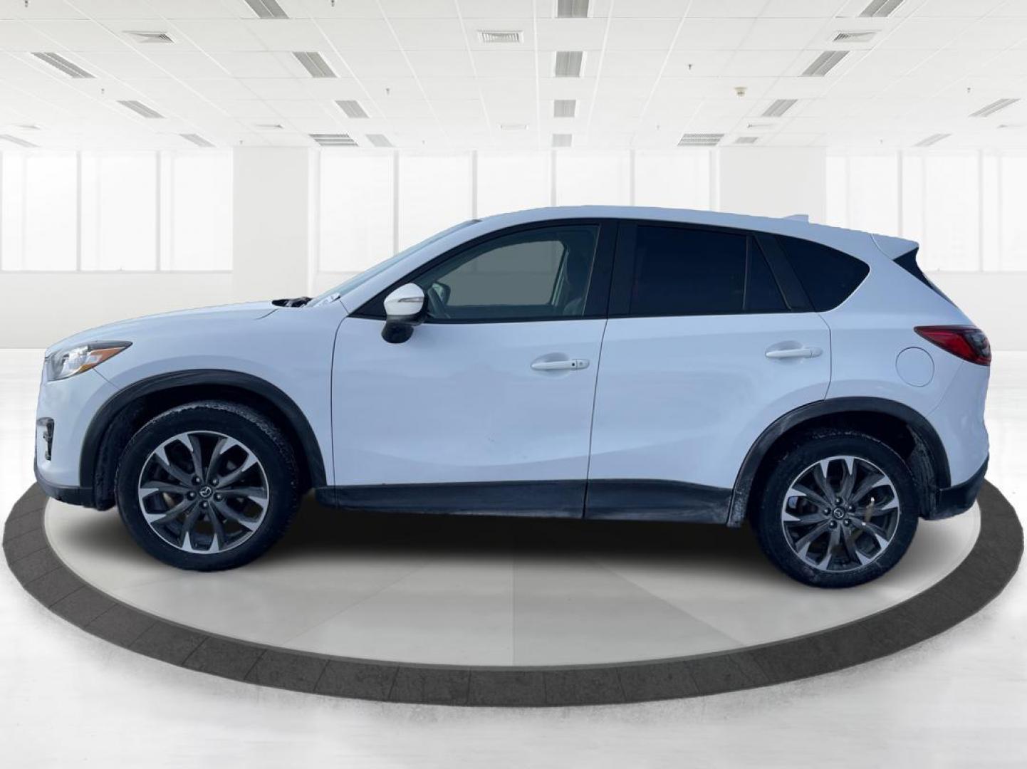 2016 Mazda CX-5 Grand Touring AWD (JM3KE4DY8G0) with an 2.5L L4 DOHC 16V engine, 6-Speed Automatic transmission, located at 1951 S Dayton Lakeview Rd., New Carlisle, OH, 45344, (937) 908-9800, 39.890999, -84.050255 - 2016 Mazda CX-5 Grand Touring AWD - Photo#5