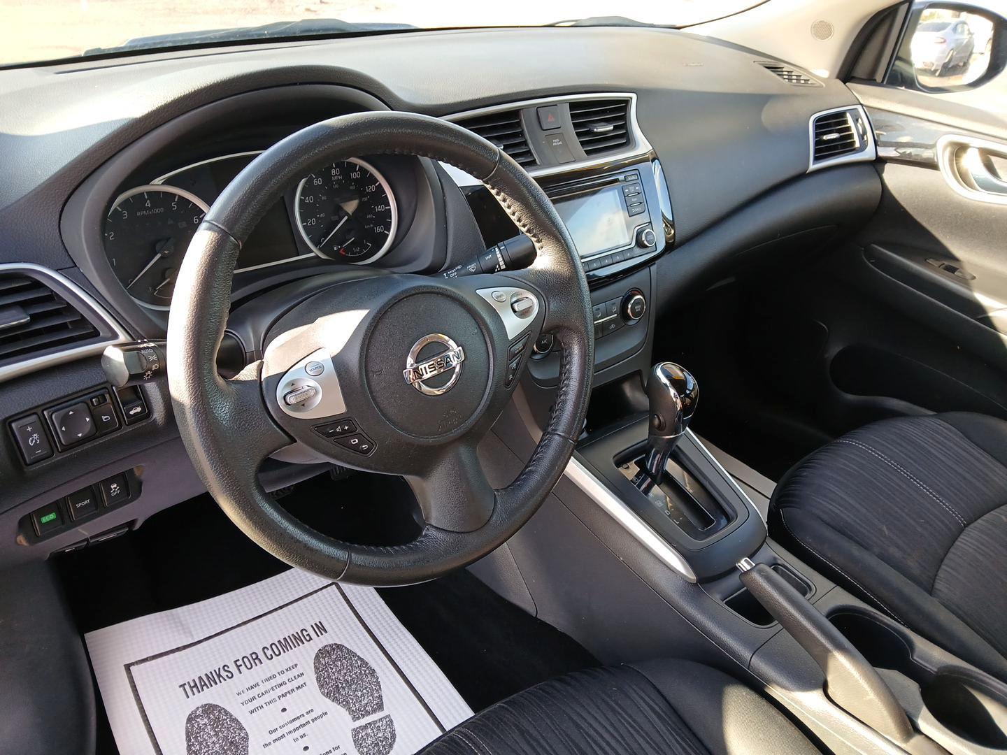 2016 Super Black Nissan Sentra FE+ S (3N1AB7AP2GL) with an 1.8L L4 SFI DOHC 16V engine, CVT transmission, located at 1099 N County Rd 25A , Troy, OH, 45373, (937) 908-9800, 40.057079, -84.212883 - Photo#8