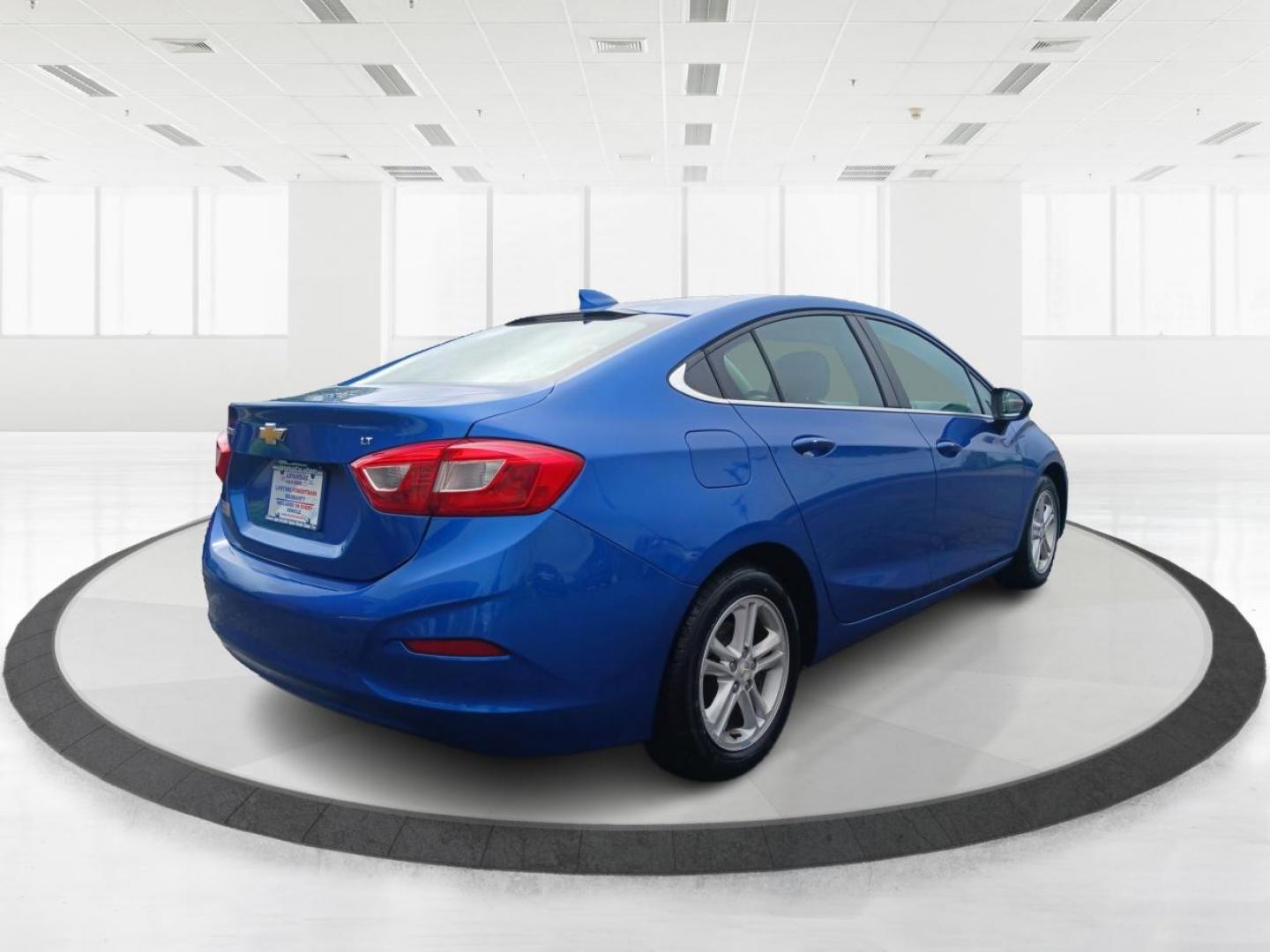 2017 Kinetic Blue Metallic Chevrolet Cruze LT Auto (1G1BE5SM3H7) with an 1.4L L4 DOHC 16V TURBO engine, 6-Speed Automatic transmission, located at 1230 East Main St, Xenia, OH, 45385, (937) 908-9800, 39.688026, -83.910172 - Photo#2