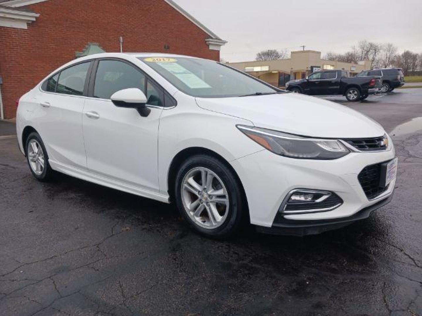 2017 Summit White Chevrolet Cruze LT Auto (1G1BE5SM9H7) with an 1.4L L4 DOHC 16V TURBO engine, 6-Speed Automatic transmission, located at 1951 S Dayton Lakeview Rd., New Carlisle, OH, 45344, (937) 908-9800, 39.890999, -84.050255 - Photo#0