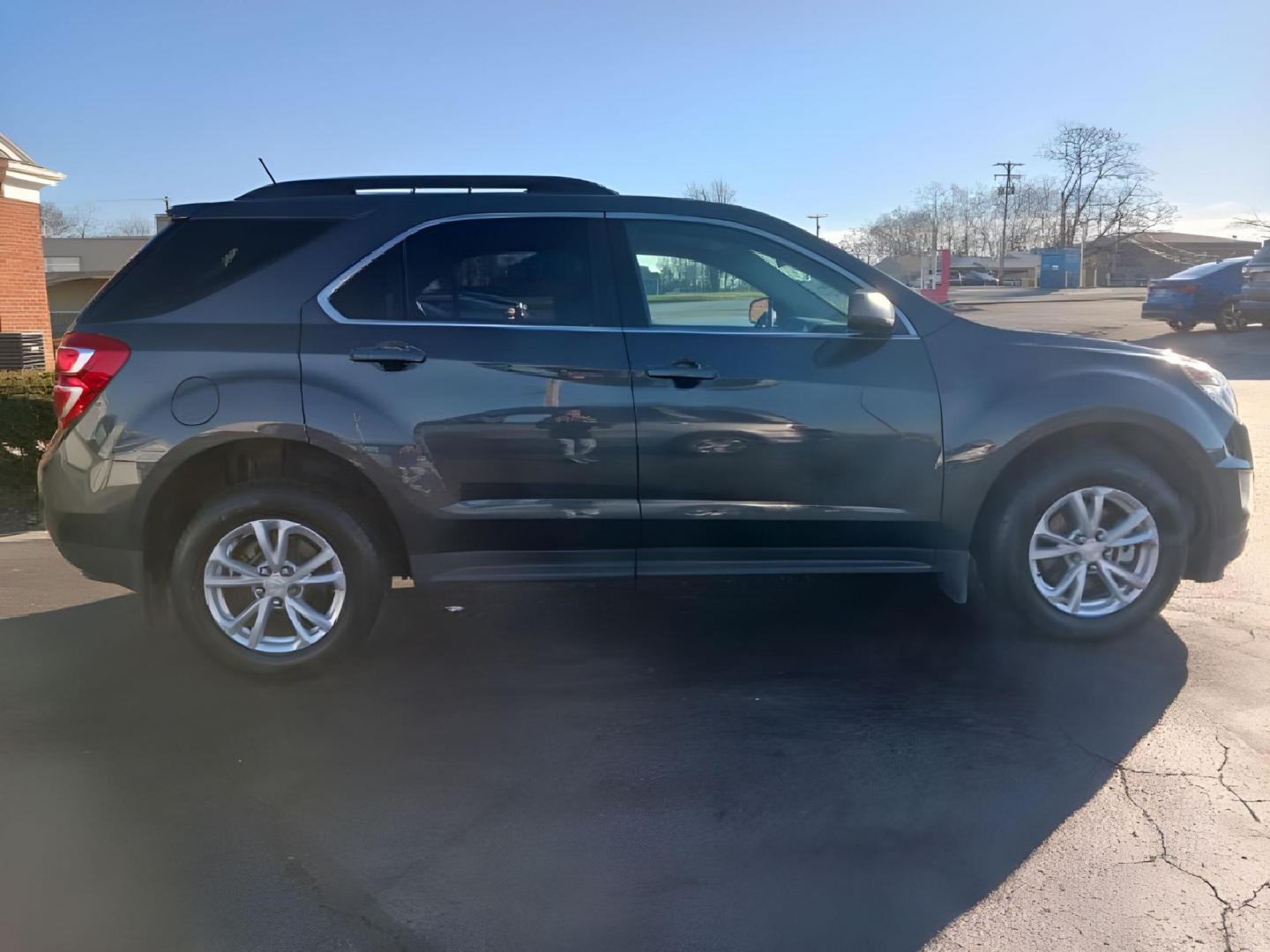 2017 Patriot Blue Metallic Chevrolet Equinox LT AWD (2GNFLFEK9H6) with an 2.4L L4 DOHC 16V FFV engine, 6A transmission, located at 4508 South Dixie Dr, Moraine, OH, 45439, (937) 908-9800, 39.689976, -84.218452 - Photo#11