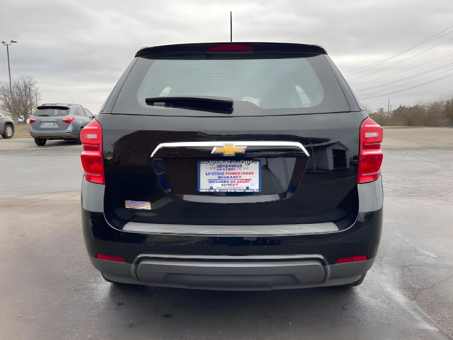 2017 Black Chevrolet Equinox (2GNALBEK2H1) with an 2.4L L4 DOHC 16V FFV engine, 6-Speed Automatic transmission, located at 401 Woodman Dr, Riverside, OH, 45431, (937) 908-9800, 39.760899, -84.123421 - Photo#4