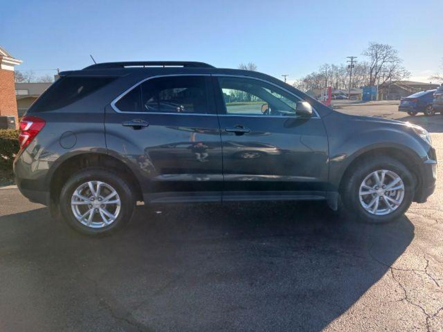 2017 Patriot Blue Metallic Chevrolet Equinox LT AWD (2GNFLFEK9H6) with an 2.4L L4 DOHC 16V FFV engine, 6A transmission, located at 4508 South Dixie Dr, Moraine, OH, 45439, (937) 908-9800, 39.689976, -84.218452 - Photo#8