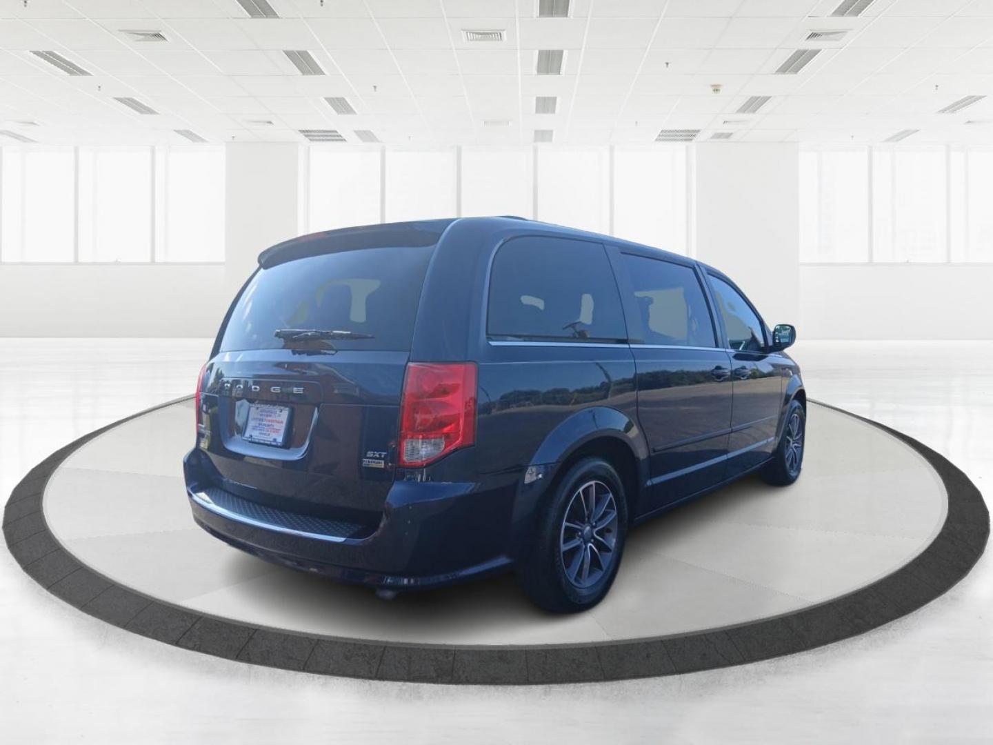 2017 Contusion Blue Pearl Coat Dodge Grand Caravan SXT (2C4RDGCG0HR) with an 3.6L V6 DOHC 24V engine, 6A transmission, located at 1099 N County Rd 25A , Troy, OH, 45373, (937) 908-9800, 40.057079, -84.212883 - Photo#2