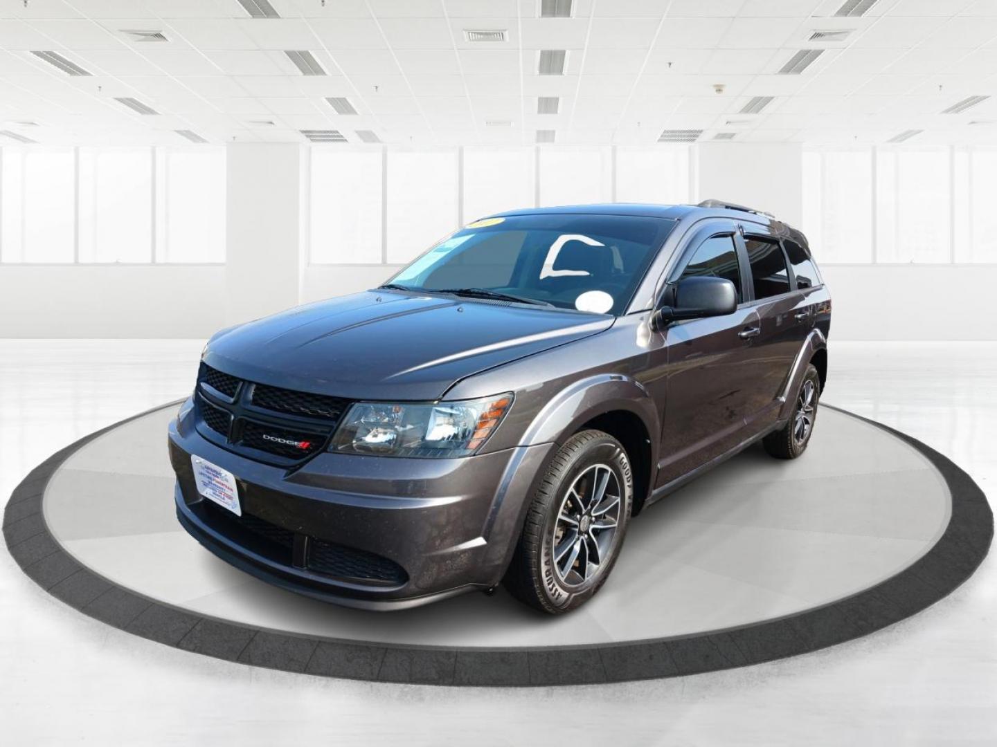 2017 Granite Metallic Clear Coat Dodge Journey SE (3C4PDCAB5HT) with an 2.4L L4 DOHC 16V engine, 4A transmission, located at 1184 Kauffman Ave, Fairborn, OH, 45324, (937) 908-9800, 39.807072, -84.030914 - Photo#4