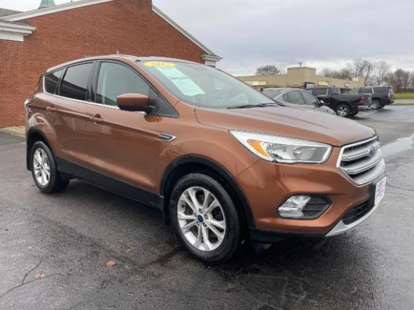 2017 Canyon Ridge Metallic Ford Escape SE 4WD (1FMCU9GDXHU) with an 1.5L L4 DOHC 16V engine, 6-Speed Automatic transmission, located at 1184 Kauffman Ave, Fairborn, OH, 45324, (937) 908-9800, 39.807072, -84.030914 - Photo#0