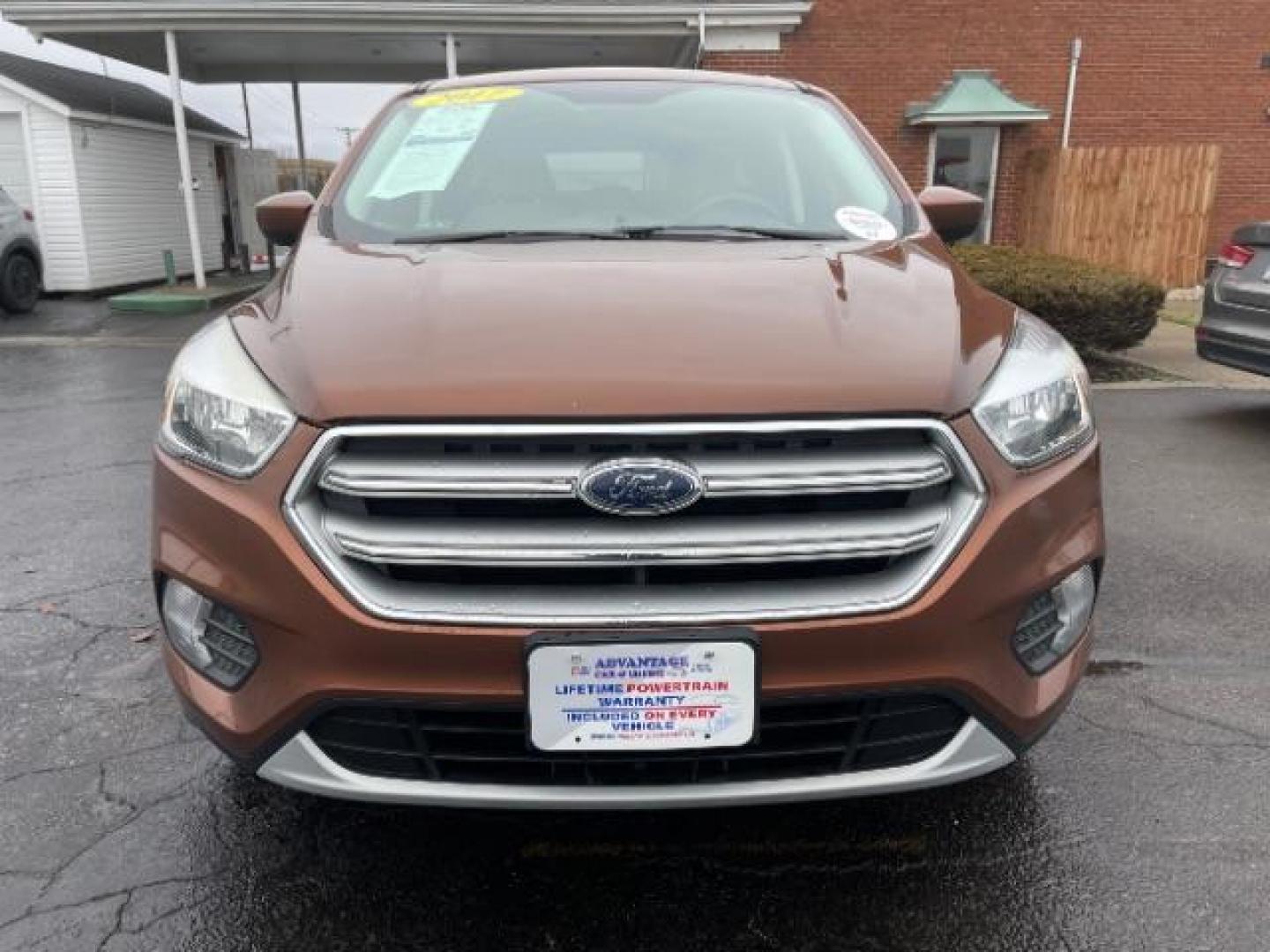 2017 Canyon Ridge Metallic Ford Escape SE 4WD (1FMCU9GDXHU) with an 1.5L L4 DOHC 16V engine, 6-Speed Automatic transmission, located at 1184 Kauffman Ave, Fairborn, OH, 45324, (937) 908-9800, 39.807072, -84.030914 - Photo#5