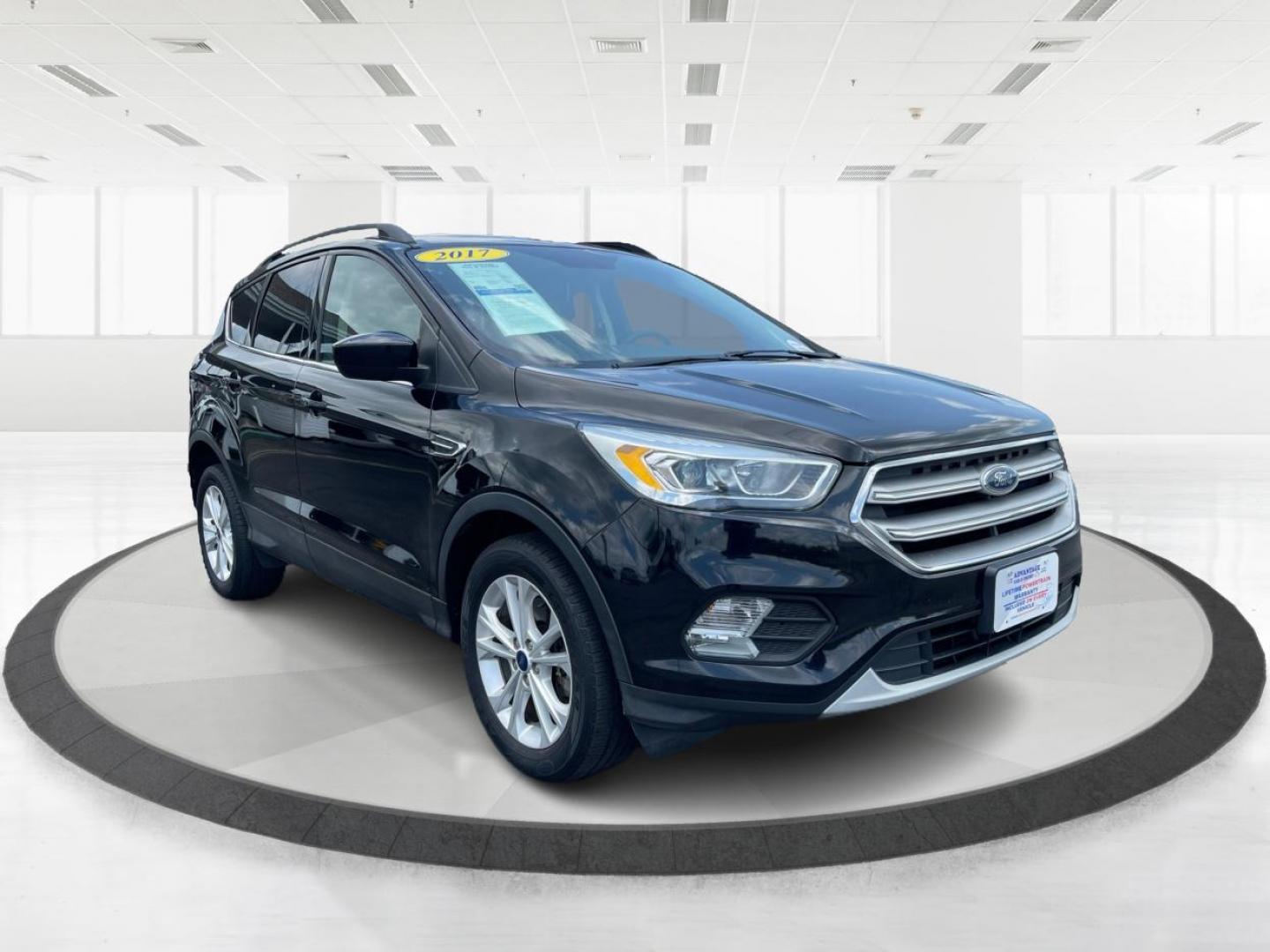 2017 Shadow Black Ford Escape SE 4WD (1FMCU9GD9HU) with an 1.5L L4 DOHC 16V engine, 6A transmission, located at 1230 East Main St, Xenia, OH, 45385, (937) 908-9800, 39.688026, -83.910172 - Photo#0