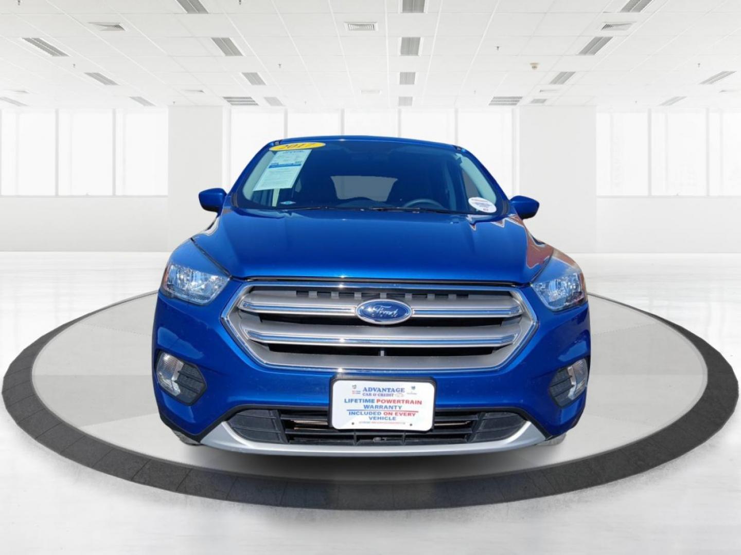 2017 Lightning Blue Metallic Ford Escape SE 4WD (1FMCU9G93HU) with an 2.0L L4 DOHC 16V engine, 6A transmission, located at 1099 N County Rd 25A , Troy, OH, 45373, (937) 908-9800, 40.057079, -84.212883 - Photo#6