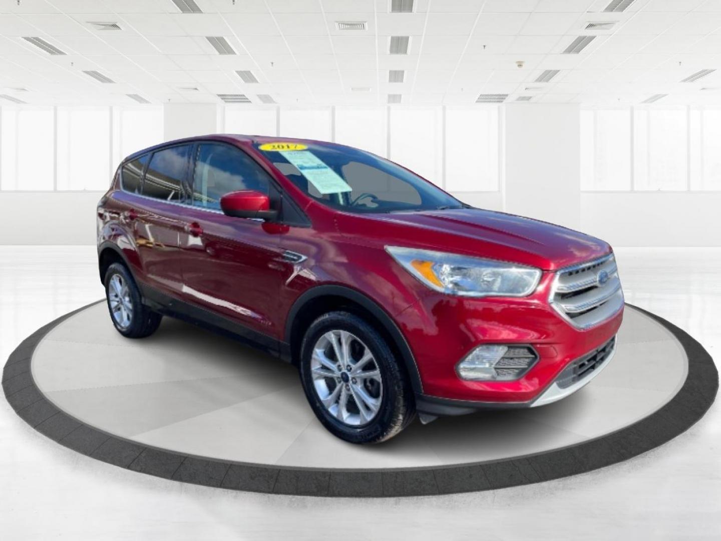 2017 Ruby Red Metallic Tinted Clearcoat Ford Escape SE 4WD (1FMCU9GD4HU) with an 1.5L L4 DOHC 16V engine, 6A transmission, located at 1184 Kauffman Ave, Fairborn, OH, 45324, (937) 908-9800, 39.807072, -84.030914 - Photo#1