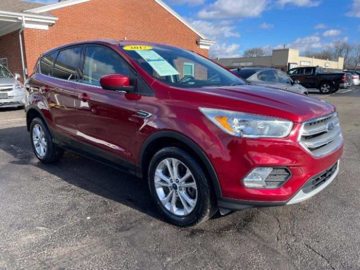 2017 Ruby Red Metallic Tinted Clearcoat Ford Escape SE 4WD (1FMCU9GD4HU) with an 1.5L L4 DOHC 16V engine, 6A transmission, located at 1184 Kauffman Ave, Fairborn, OH, 45324, (937) 908-9800, 39.807072, -84.030914 - Photo#0