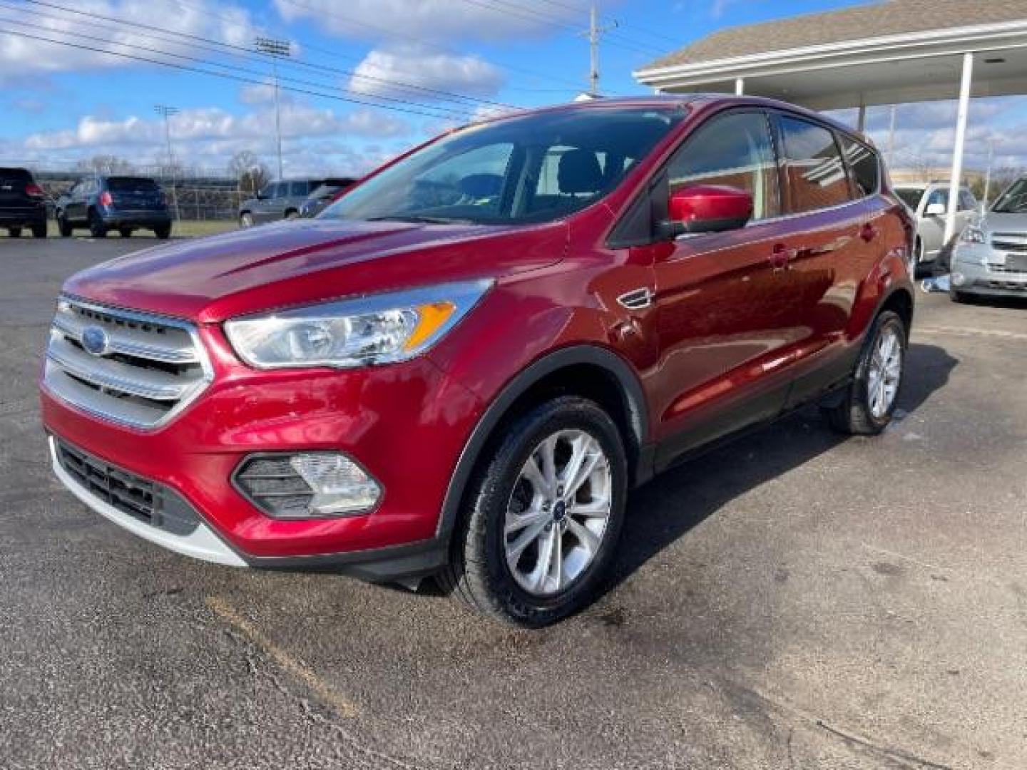 2017 Ruby Red Metallic Tinted Clearcoat Ford Escape SE 4WD (1FMCU9GD4HU) with an 1.5L L4 DOHC 16V engine, 6A transmission, located at 1184 Kauffman Ave, Fairborn, OH, 45324, (937) 908-9800, 39.807072, -84.030914 - Photo#2