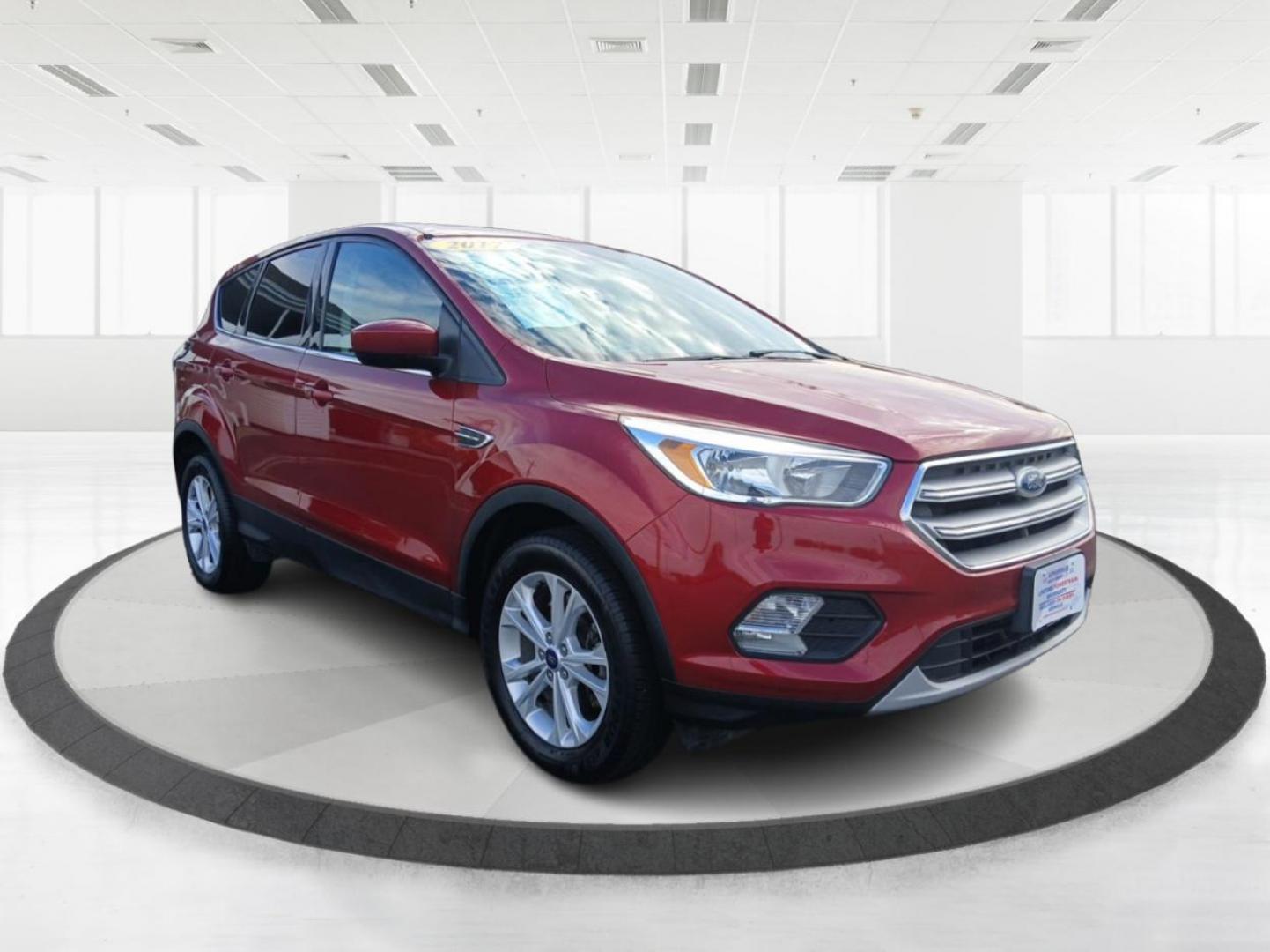 2017 Ruby Red Metallic Tinted Clearcoat Ford Escape (1FMCU9GD0HU) with an 1.5L L4 DOHC 16V engine, 6-Speed Automatic transmission, located at 880 E. National Road, Vandalia, OH, 45377, (937) 908-9800, 39.891918, -84.183594 - Photo#0