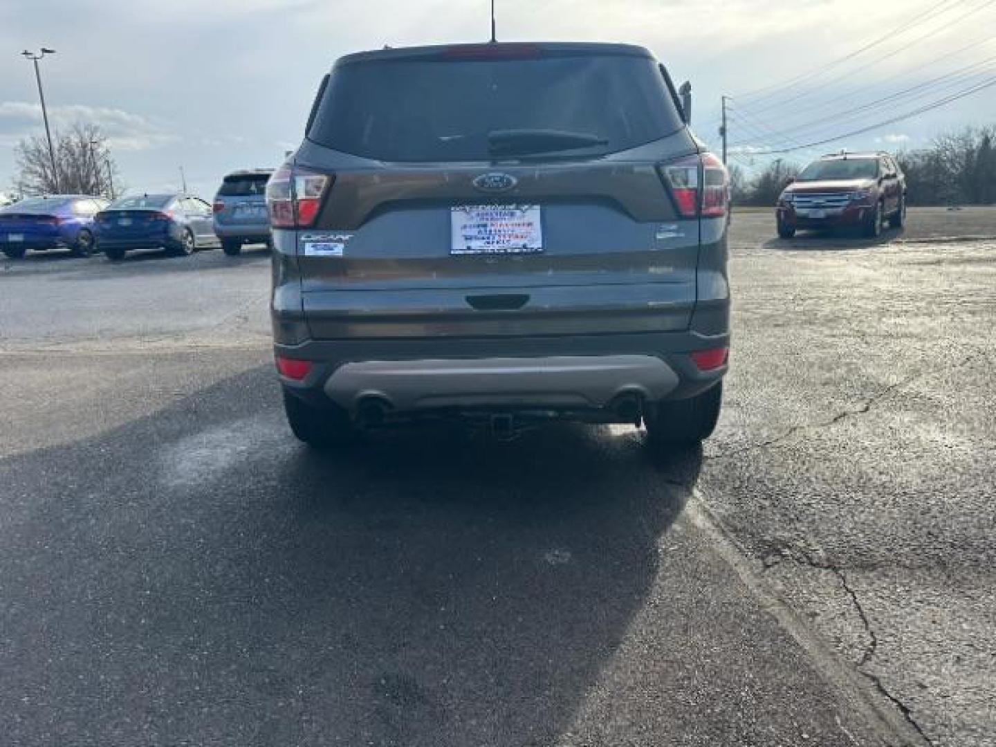 2017 Magnetic Metallic Ford Escape SE 4WD (1FMCU9G91HU) with an 2.0L L4 DOHC 16V engine, 6-Speed Automatic transmission, located at 1951 S Dayton Lakeview Rd., New Carlisle, OH, 45344, (937) 908-9800, 39.890999, -84.050255 - Photo#4