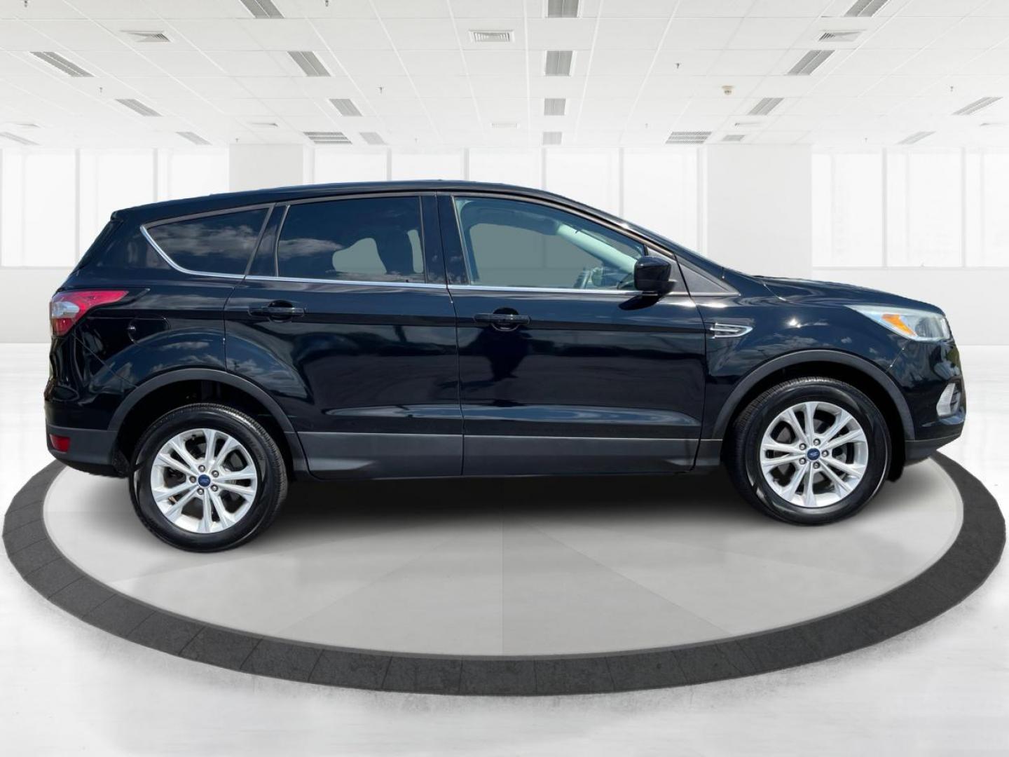 2017 Shadow Black Ford Escape SE FWD (1FMCU0GD6HU) with an 1.5L L4 DOHC 16V engine, 6-Speed Automatic transmission, located at 1230 East Main St, Xenia, OH, 45385, (937) 908-9800, 39.688026, -83.910172 - Photo#1