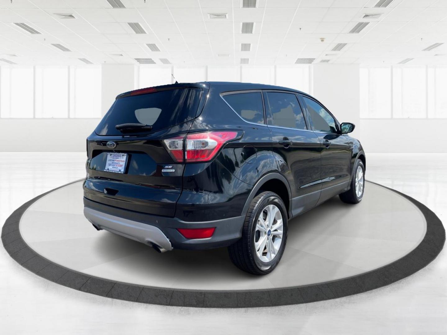 2017 Shadow Black Ford Escape SE FWD (1FMCU0GD6HU) with an 1.5L L4 DOHC 16V engine, 6-Speed Automatic transmission, located at 1230 East Main St, Xenia, OH, 45385, (937) 908-9800, 39.688026, -83.910172 - Photo#2