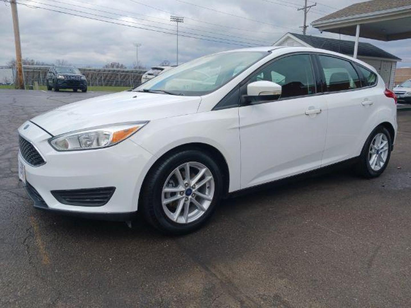 2017 Oxford White Ford Focus SE Hatch (1FADP3K23HL) with an 2.0L L4 DOHC 16V engine, located at 4508 South Dixie Dr, Moraine, OH, 45439, (937) 908-9800, 39.689976, -84.218452 - Photo#2